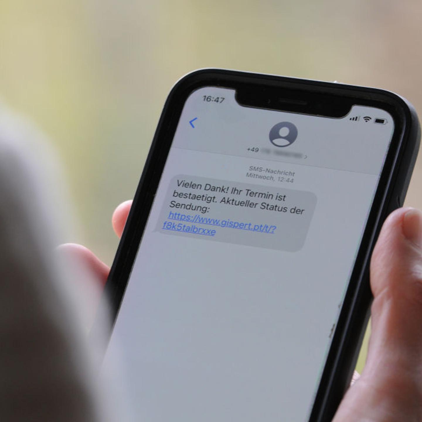Fraud SMS on a smartphone