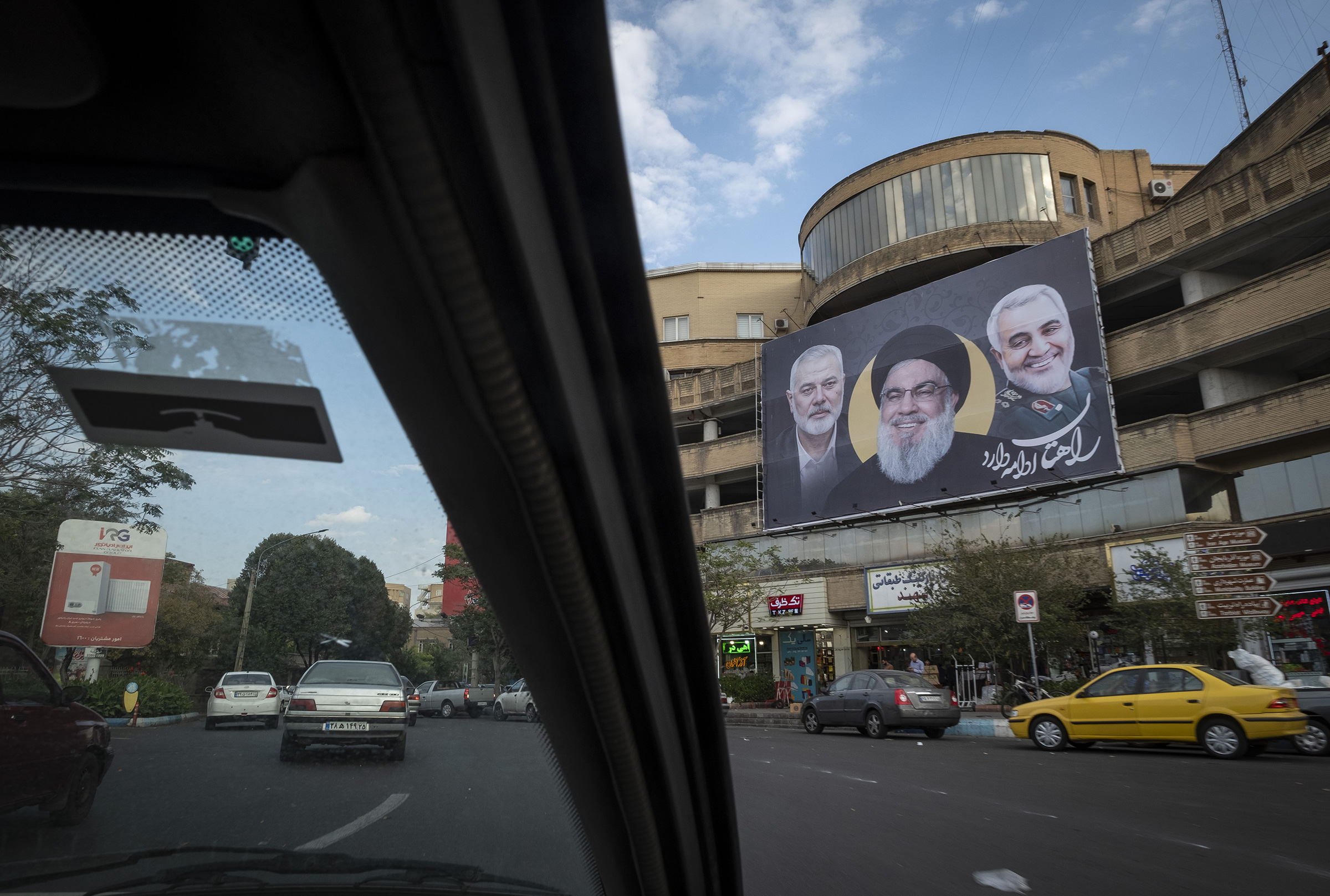 Portraits of slain "Axis of Resistance" stalwarts on a building in Tabriz, Iran on Oct. 17, 2024. From right Islamic Revolutionary Guard Corps Quds Force commander Qassem Soleimani, who was killed in Iraq; Hezbollah leader Hassan Nasrallah, killed in Leb