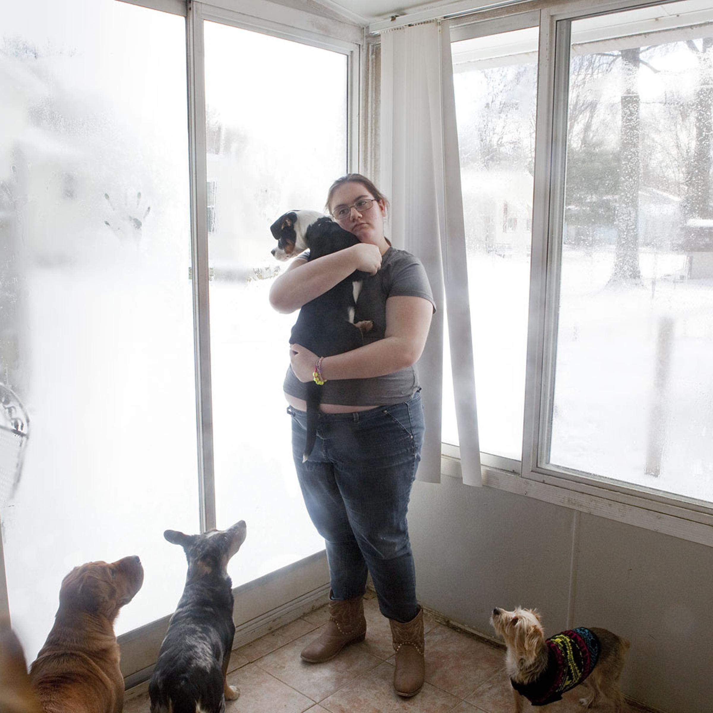 Kimberly Rhodes photographed Friday, January 3, 2014 at her family home in Boardman, Ohio