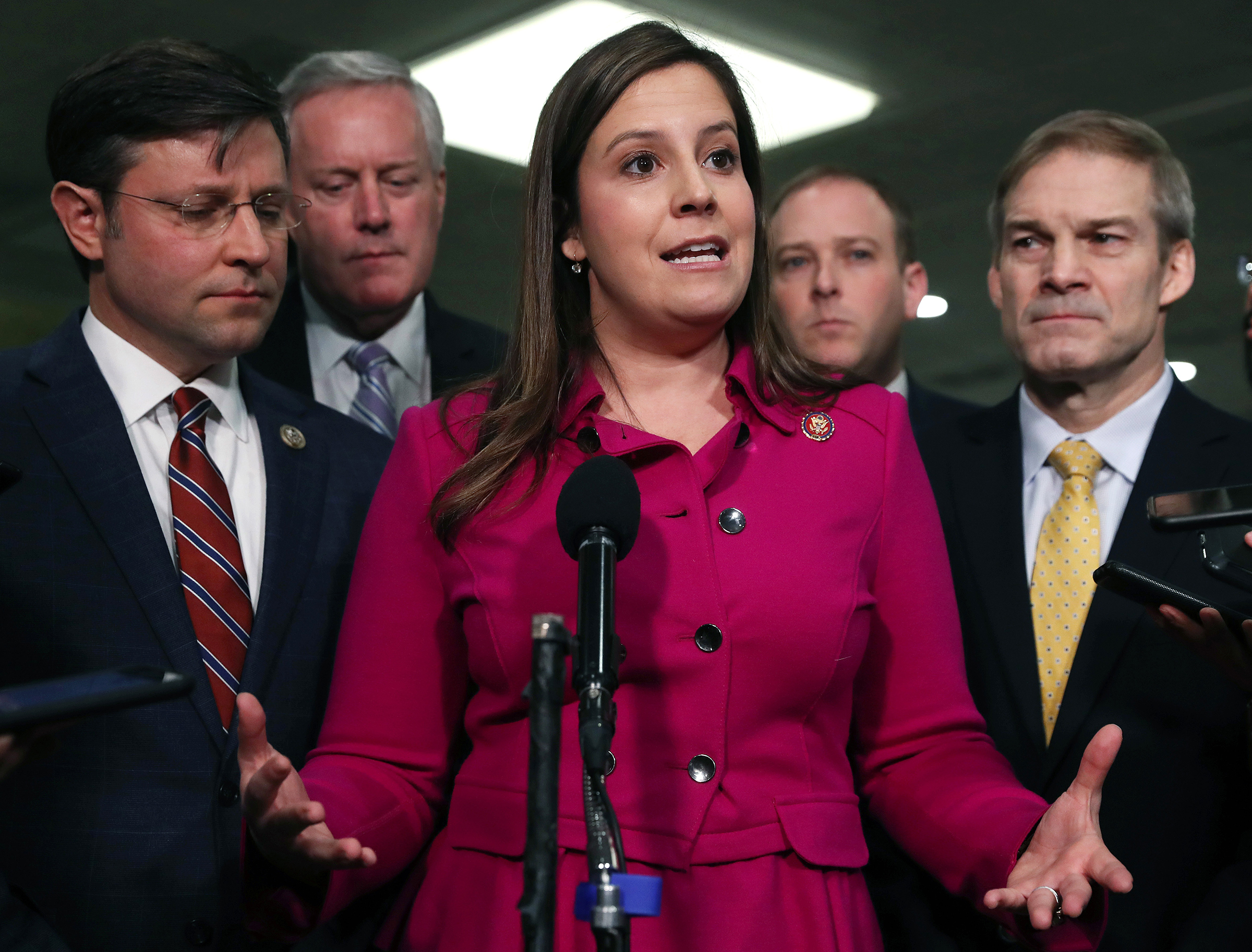 Rep. Elise Stefanik speaks with reporters in the Senate subway before the impeachment trial of former President Donald Trump resumes at the U.S. Capitol on January 23, 2020. Surrounding Stefanik, from left to right: Rep. Mike Johnson (R-LA), Rep. Mark Me