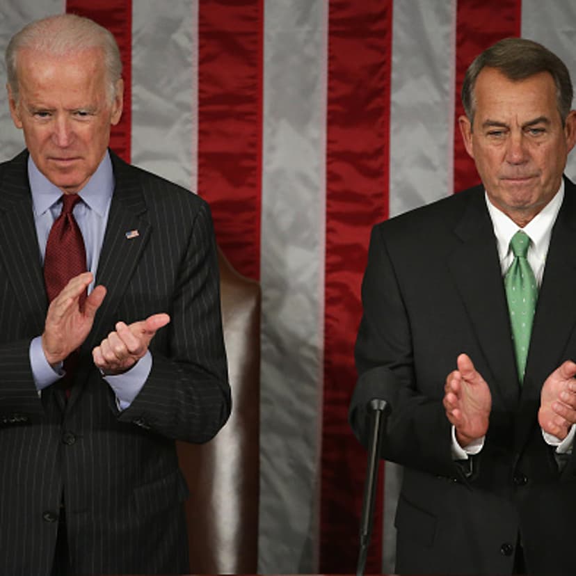 U.S. Vice President Joe Biden (L) and Speaker of the House John Boehner (R-OH) applaud for Afghanistan President Ashraf Ghani during his address to a joint meeting of the United States Congress in the House Chamber at the U.S. Capitol March 25, 2015 in W