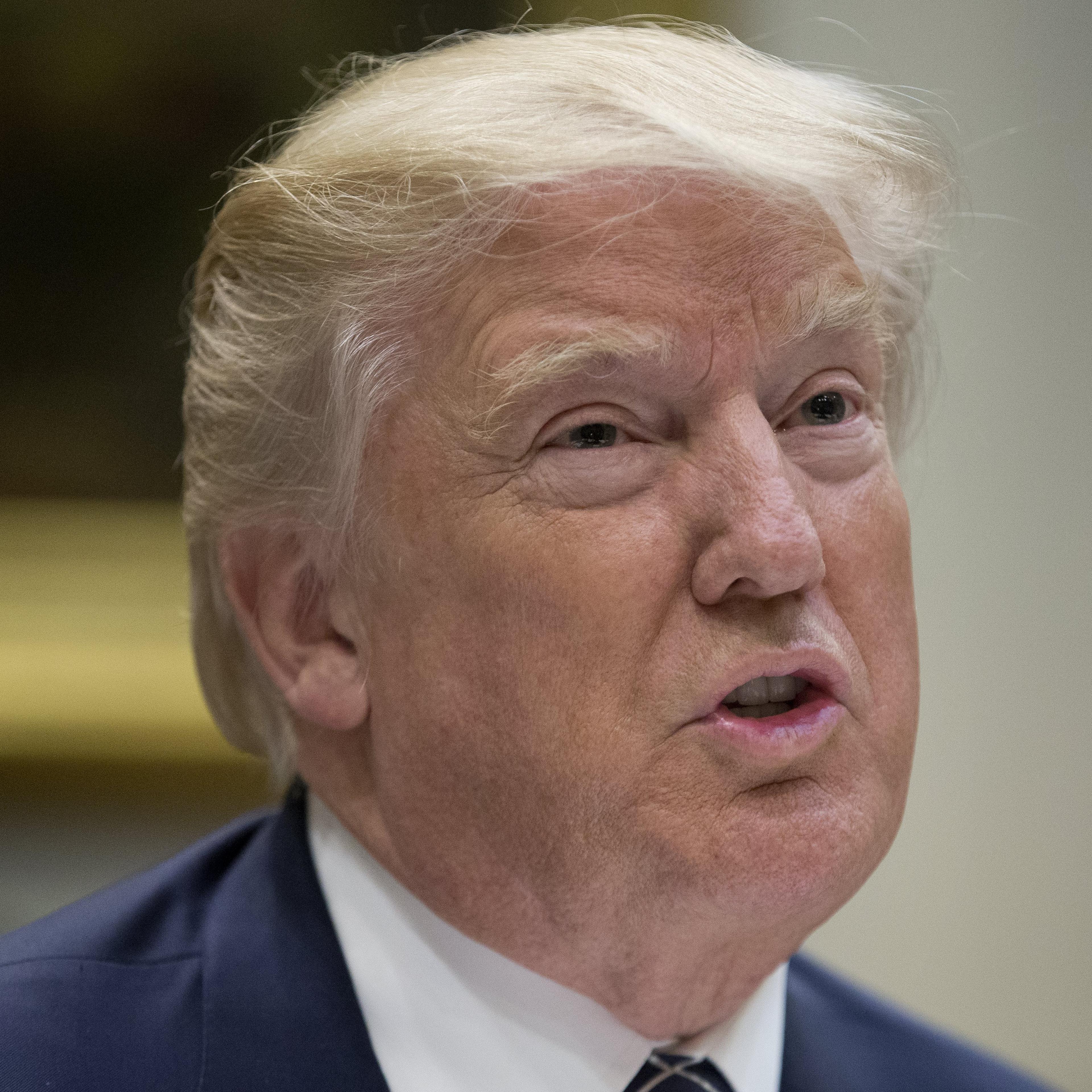 President Donald J. Trump attends a meeting with service members in which he delivered remarks on health care and the failed attempt to replace and repeal the Affordable Care Act, in the Roosevelt Room of the White House in Washington on July 18, 2017.