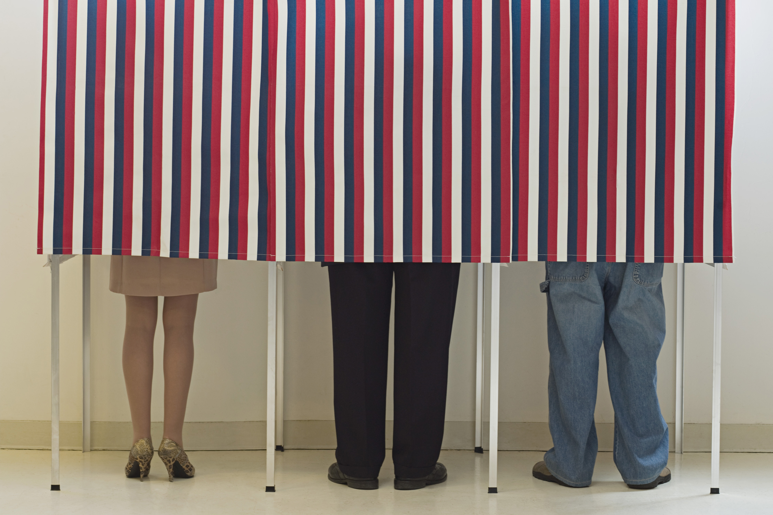 Voters in voting booths