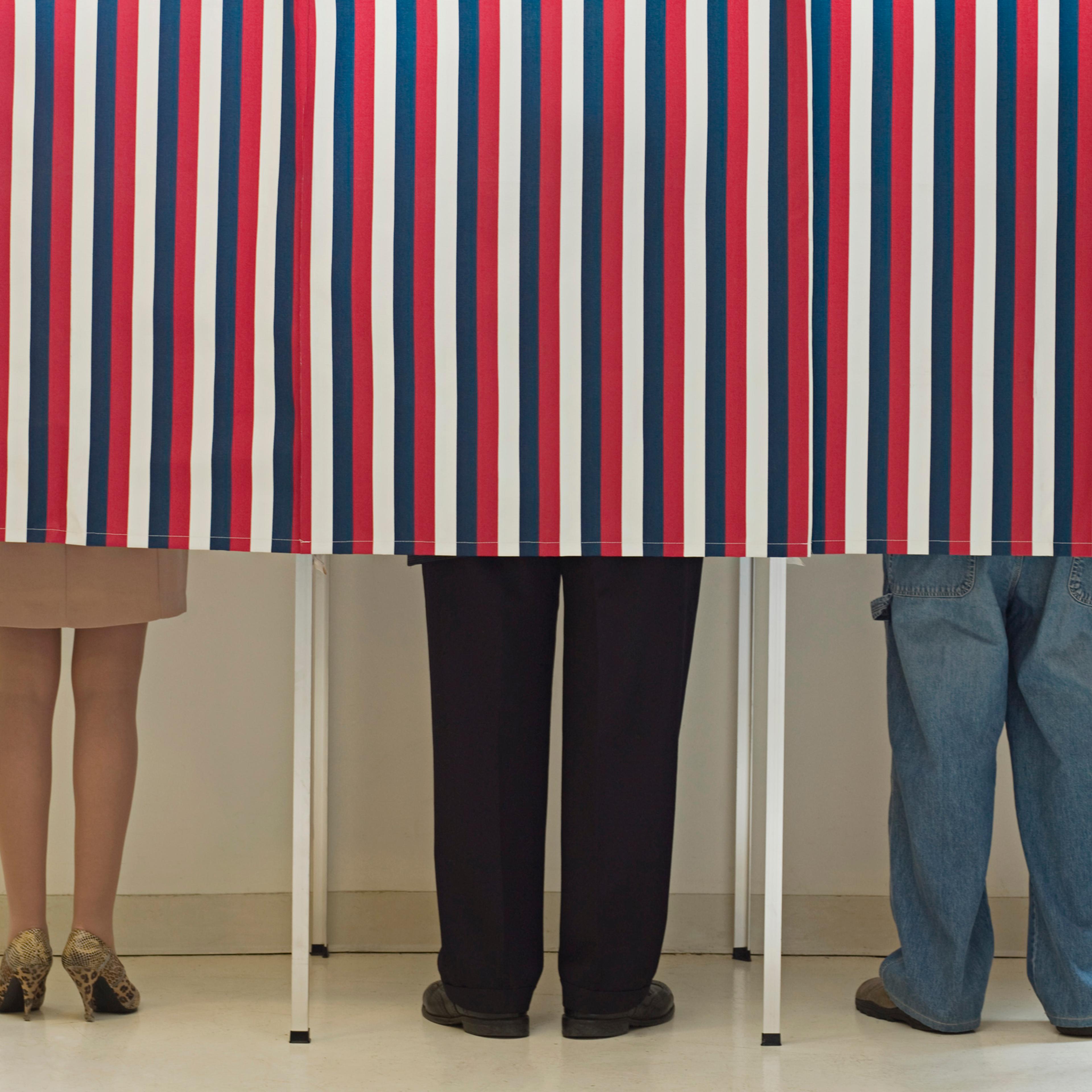 Voters in voting booths