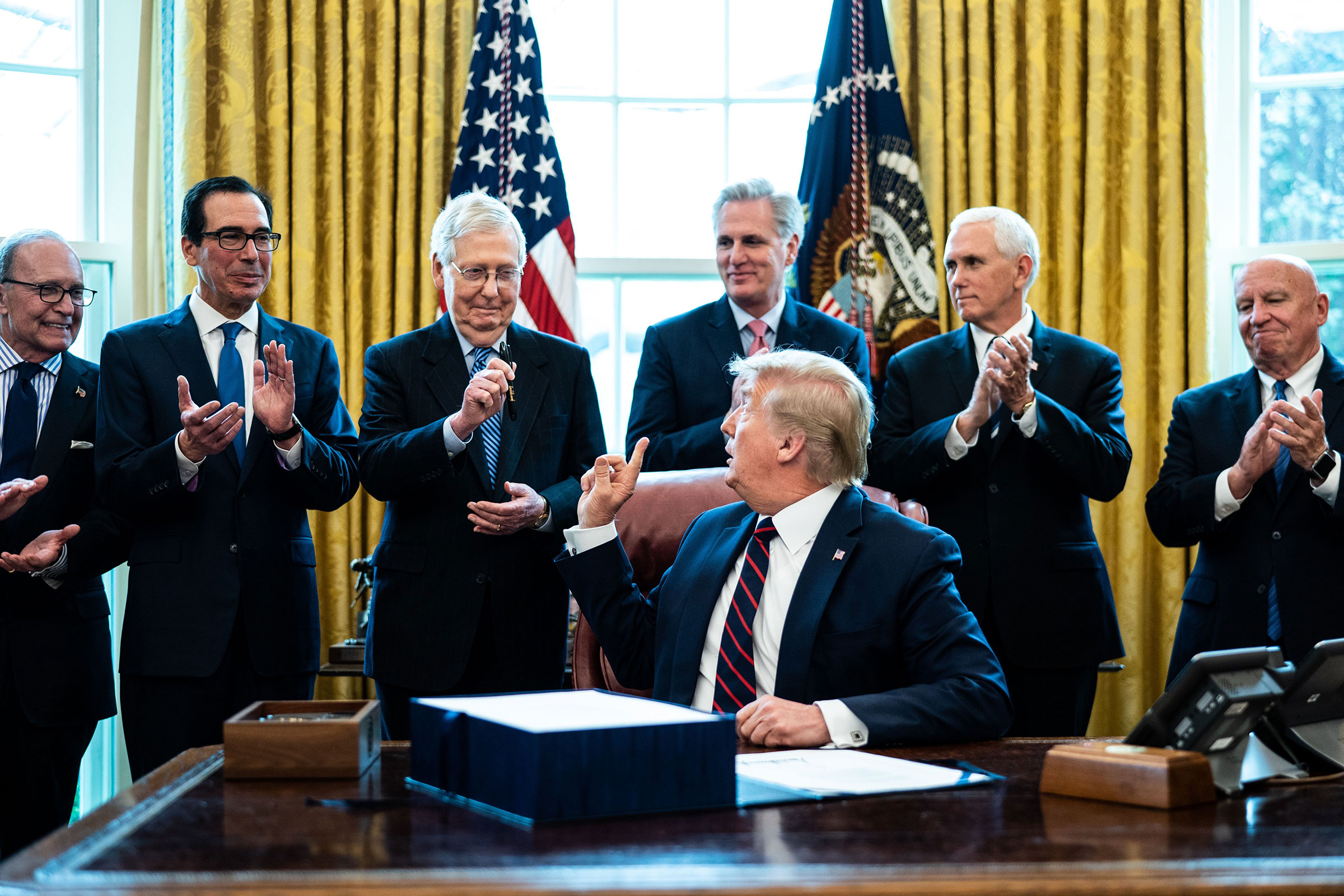 Trump participates in a signing ceremony for a two trillion dollar coronavirus relief bill, Washington, USA - 27 Mar 2020