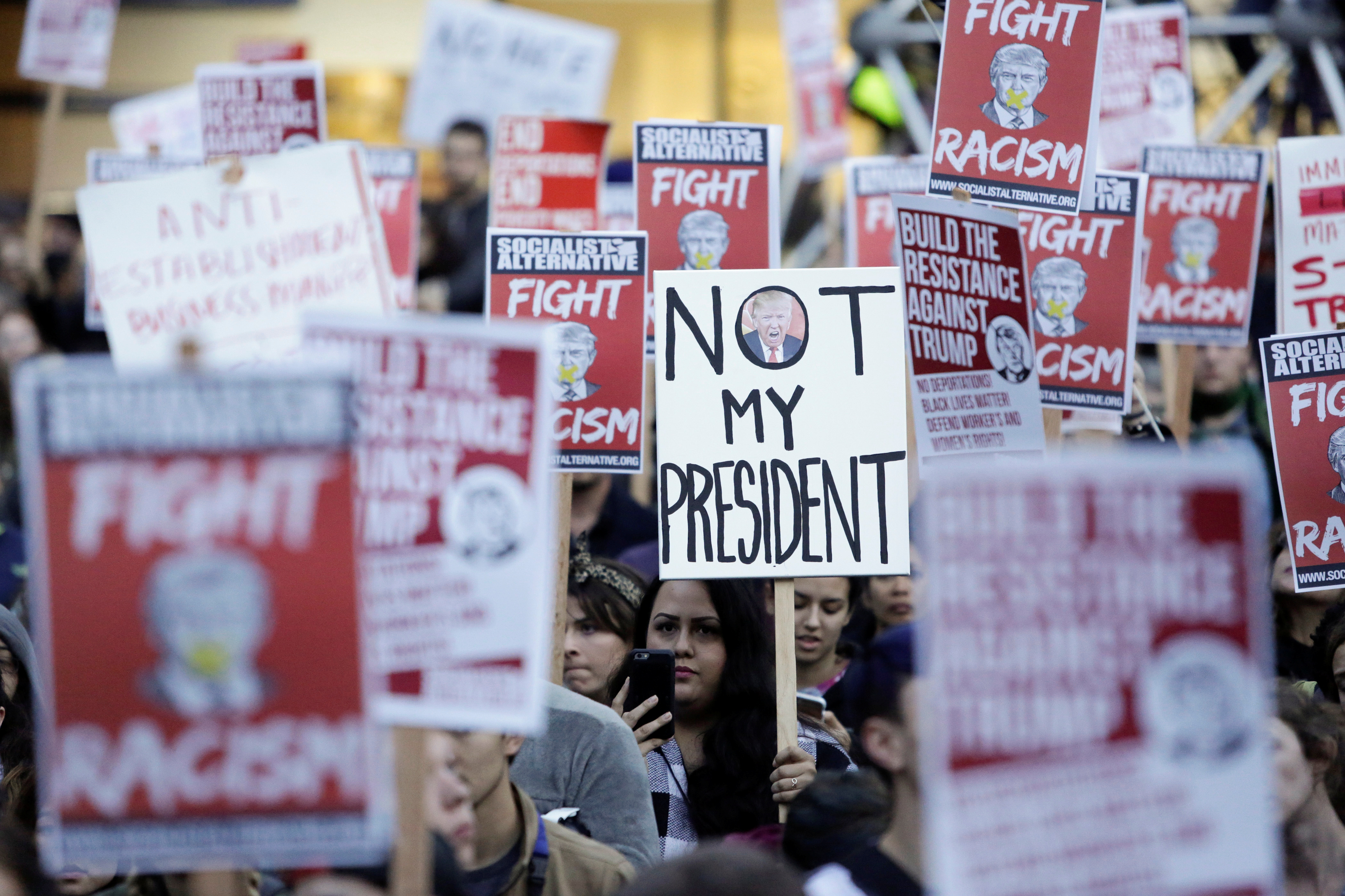 People gather in protest to the election of Republican Donald Trump as the president of the United States in Seattle