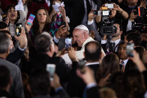 Pope Francis (C) attend a farewell ceremony with Mexican President Enrique Pena Nieto (C-R) and First Lady Angelica Rivera (not seen) at the Abraham Gonzalez International Airport in Ciudad Juarez, Mexico, Wednesday, Feb. 17, 2016.