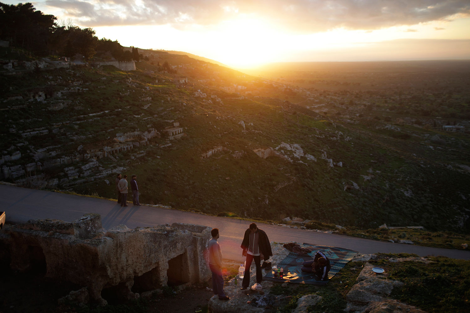 Roman ruins in Shahat, Libya. February 28, 2011.<br>
"This was my most peaceful day in Libya.  I stumbled upon a group of Libyans picnicking over a view of the western mountains. It was a moment that made you forget about the uprising. "
