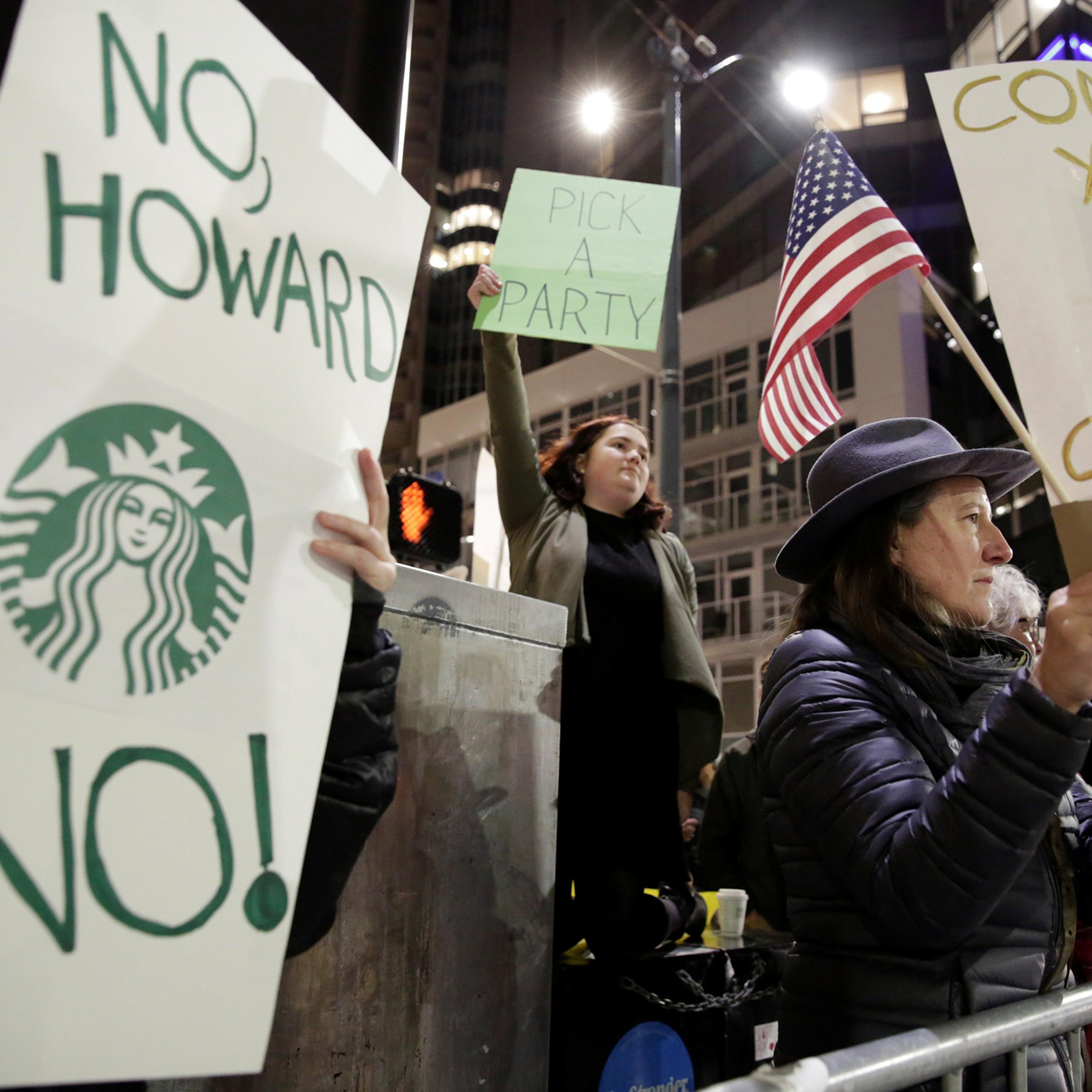 Protesters rally outside a Schultz book-tour stop in Seattle on Jan. 31