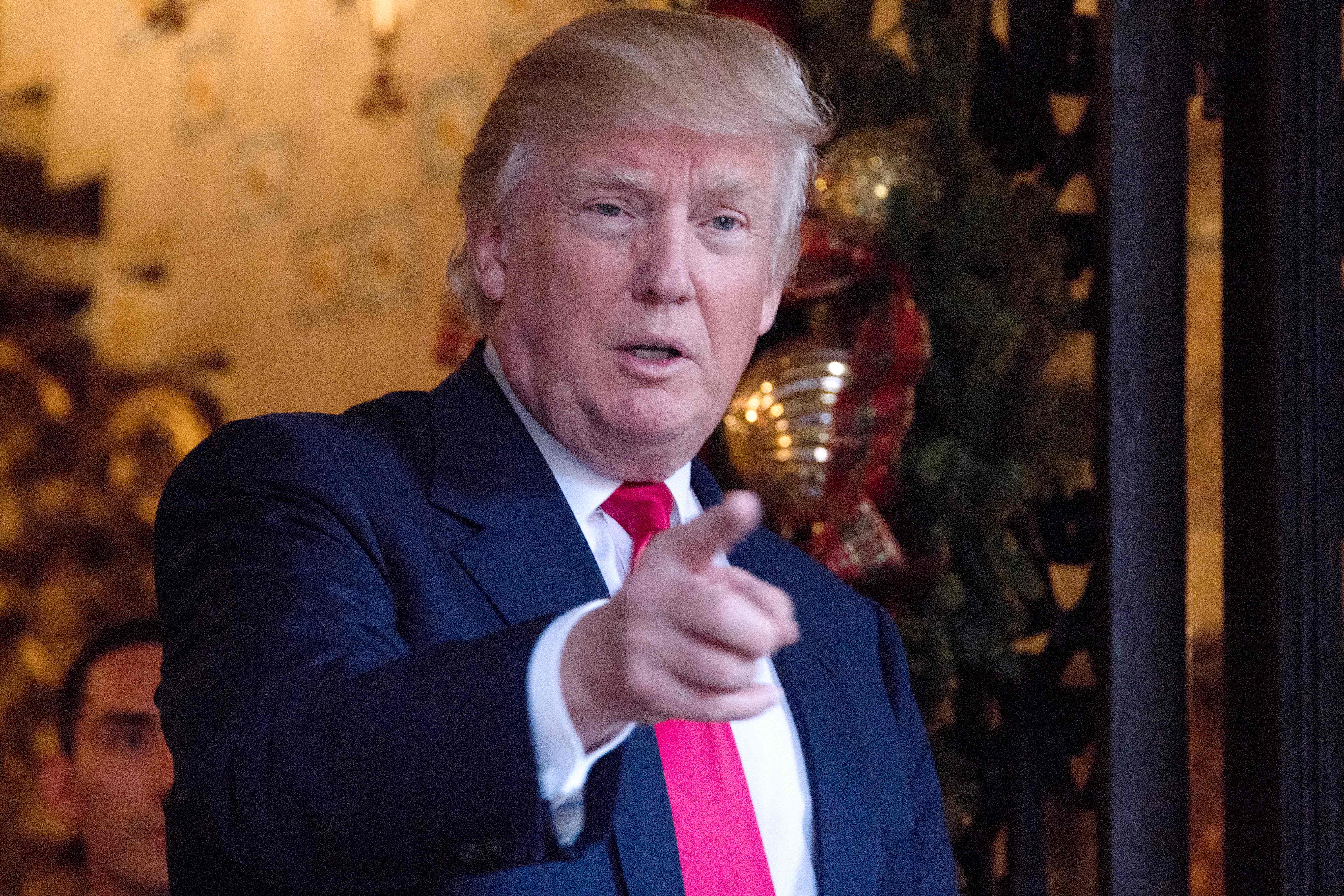President-elect Donald Trump speaks to reporters at Mar-a-Lago in Palm Beach, Florida where he is taking meetings on Dec. 21, 2016.