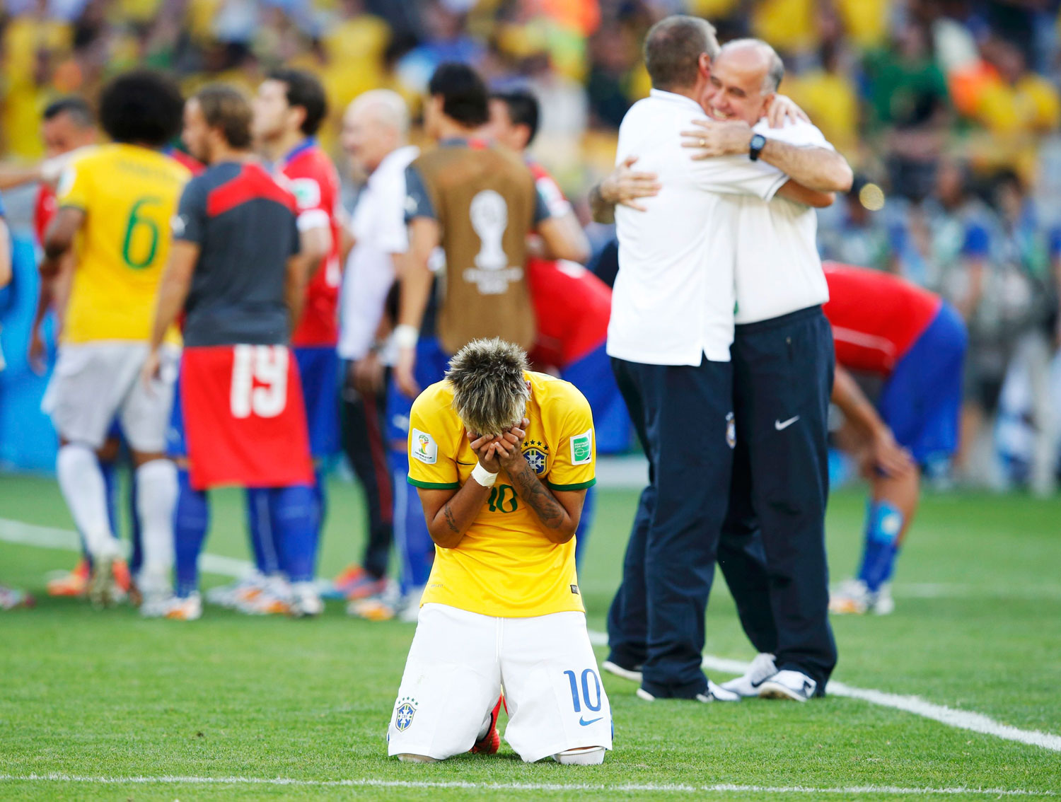 Brazil's Neymar reacts as his team celebrates their penalty shootout win against Chile at the Mineirao Stadium in Belo Horizonte, Brazil on June 28, 2014.