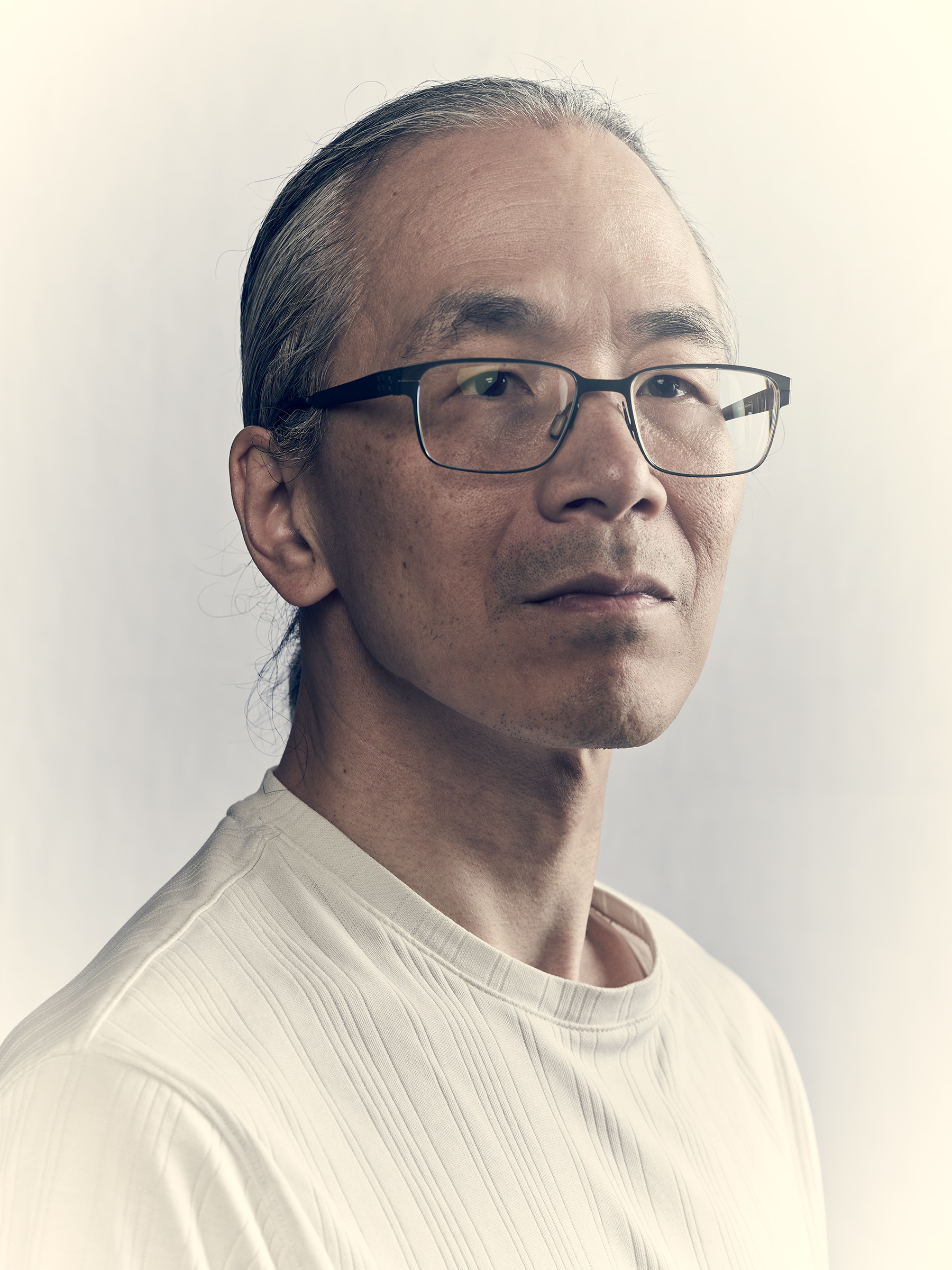 Ted Chiang against a white backdrop
