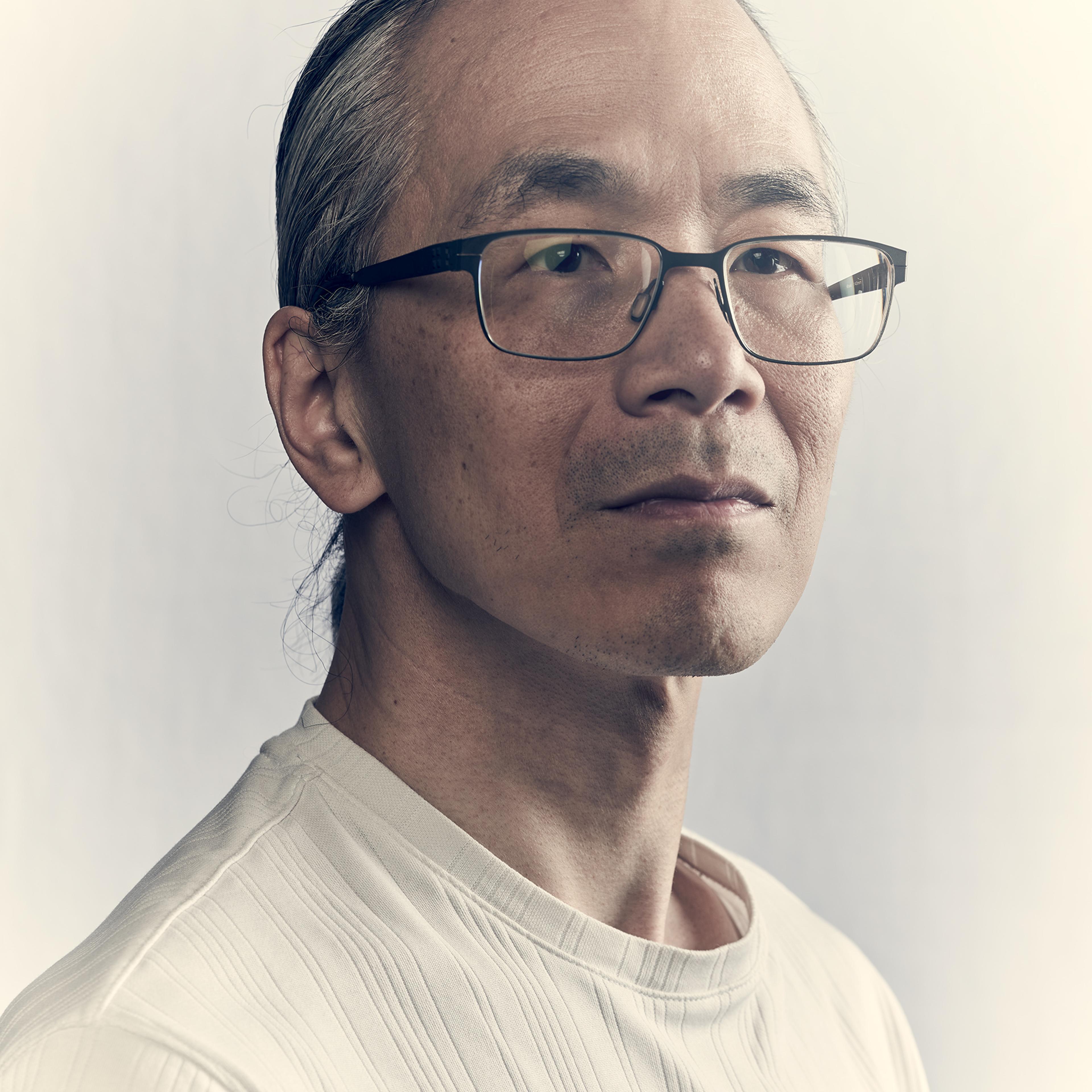 Ted Chiang against a white backdrop