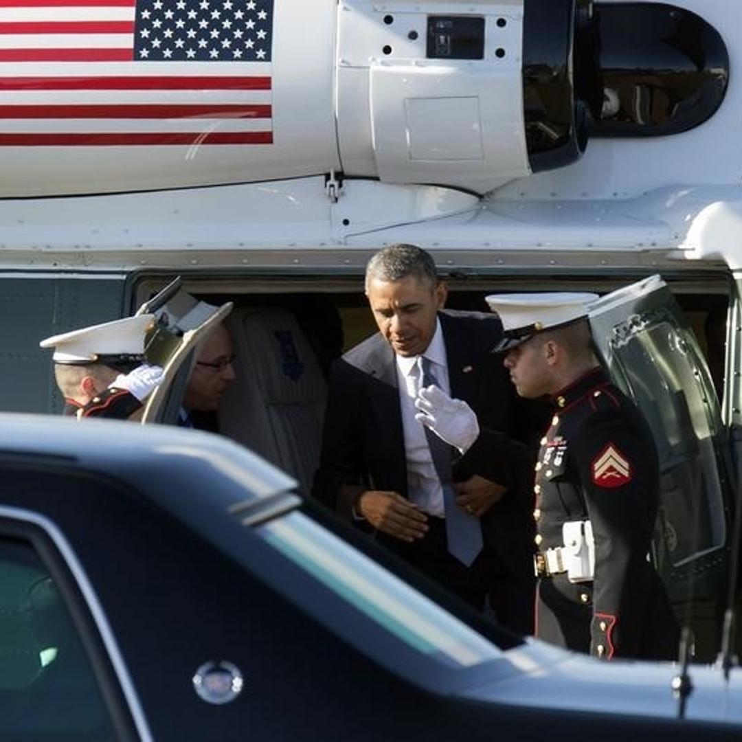 U.S. President Obama leaves the Marine One helicopter as he arrives at the Rijksmuseum on the Museumplein in Amsterdam
