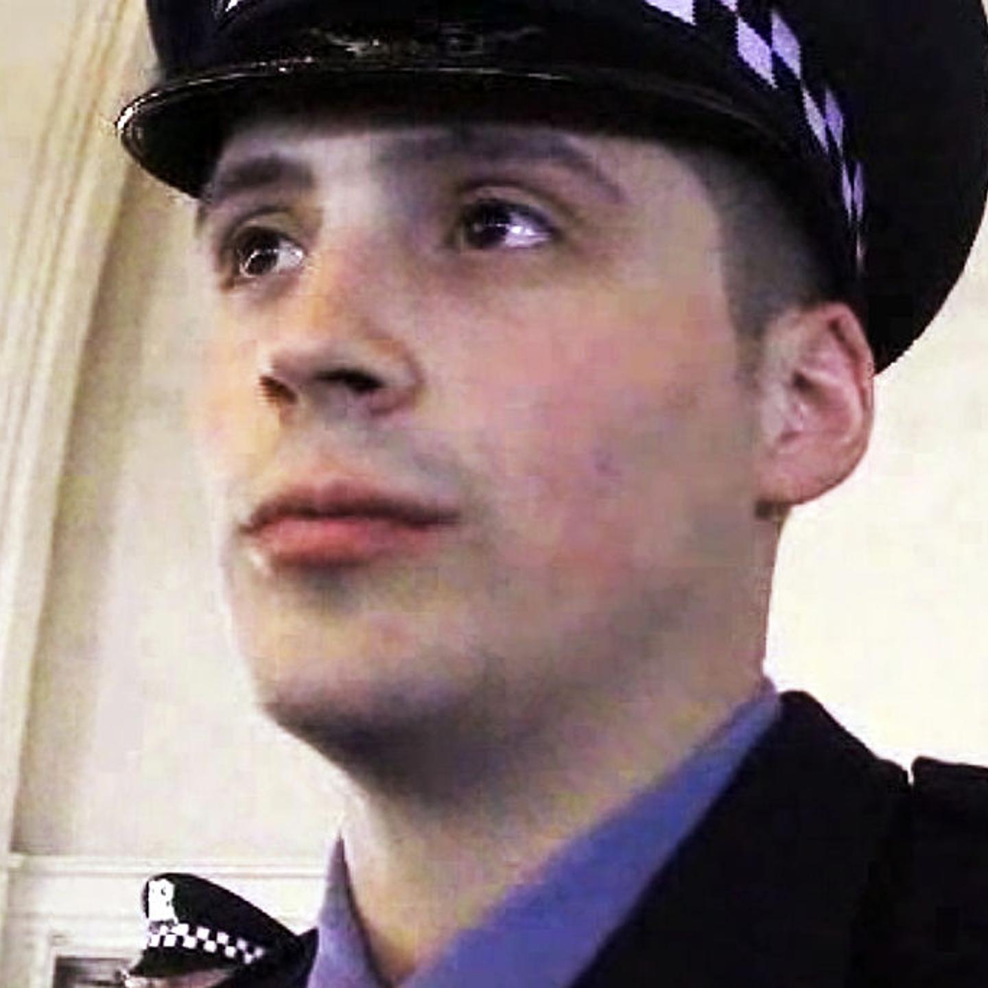Officer Robert Rialmo states what becoming an officer means to him during a interview with a Chicago Tribune reporter at the Chicago Police Academy graduation ceremony on March 26, 2013.