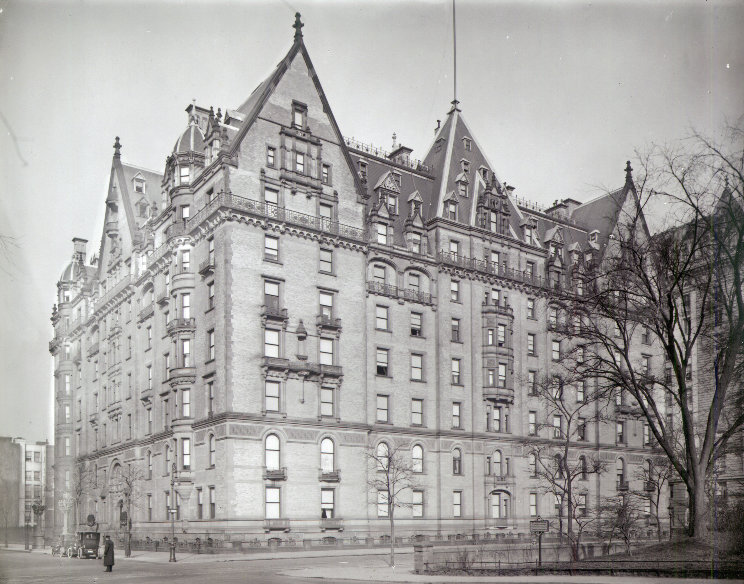 The photograph can be dated to about 1910 by the automobiles at the curb, and by the presence of the Langham Apartments at 135 Central Park West between 73rd and 74th Streets, which was completed in 1906. The sentry box for the guard has been replaced by