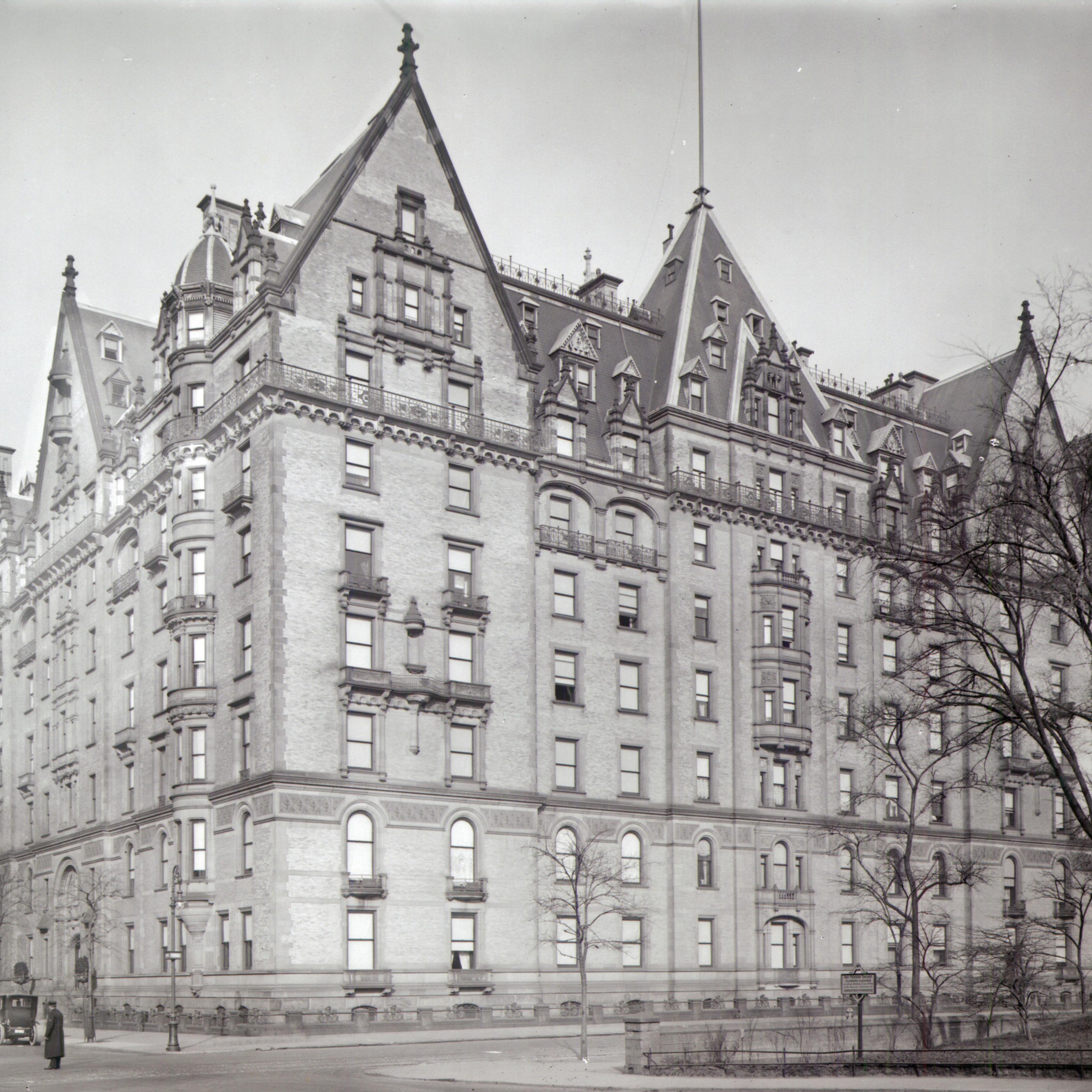 The photograph can be dated to about 1910 by the automobiles at the curb, and by the presence of the Langham Apartments
at 135 Central Park
West between 73rd and 74th Streets, which was completed in 1906. The sentry box for the guard has been replaced by