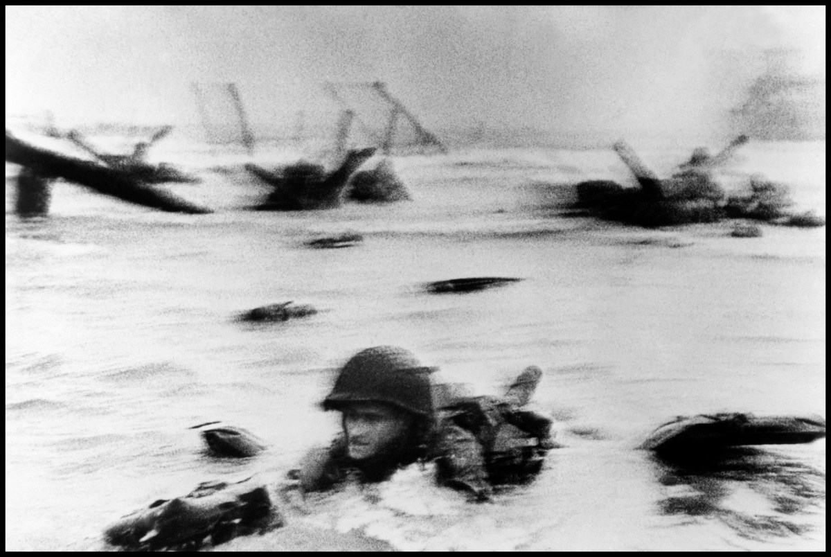 FRANCE. Normandy. June 6th, 1944. US troops assault Omaha Beach during the D-Day landings.