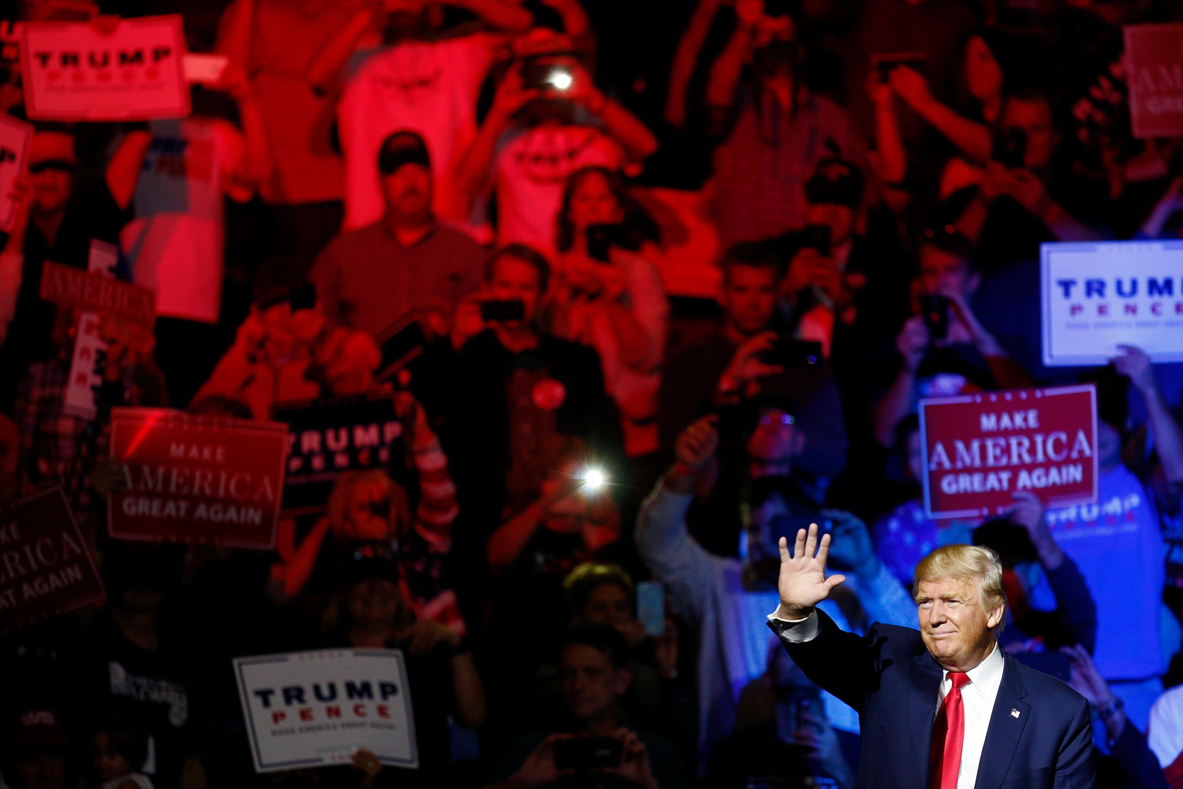 Donald Trump waves after speaking at a campaign event in Cincinnati, Ohio, on Oct. 13, 2016.