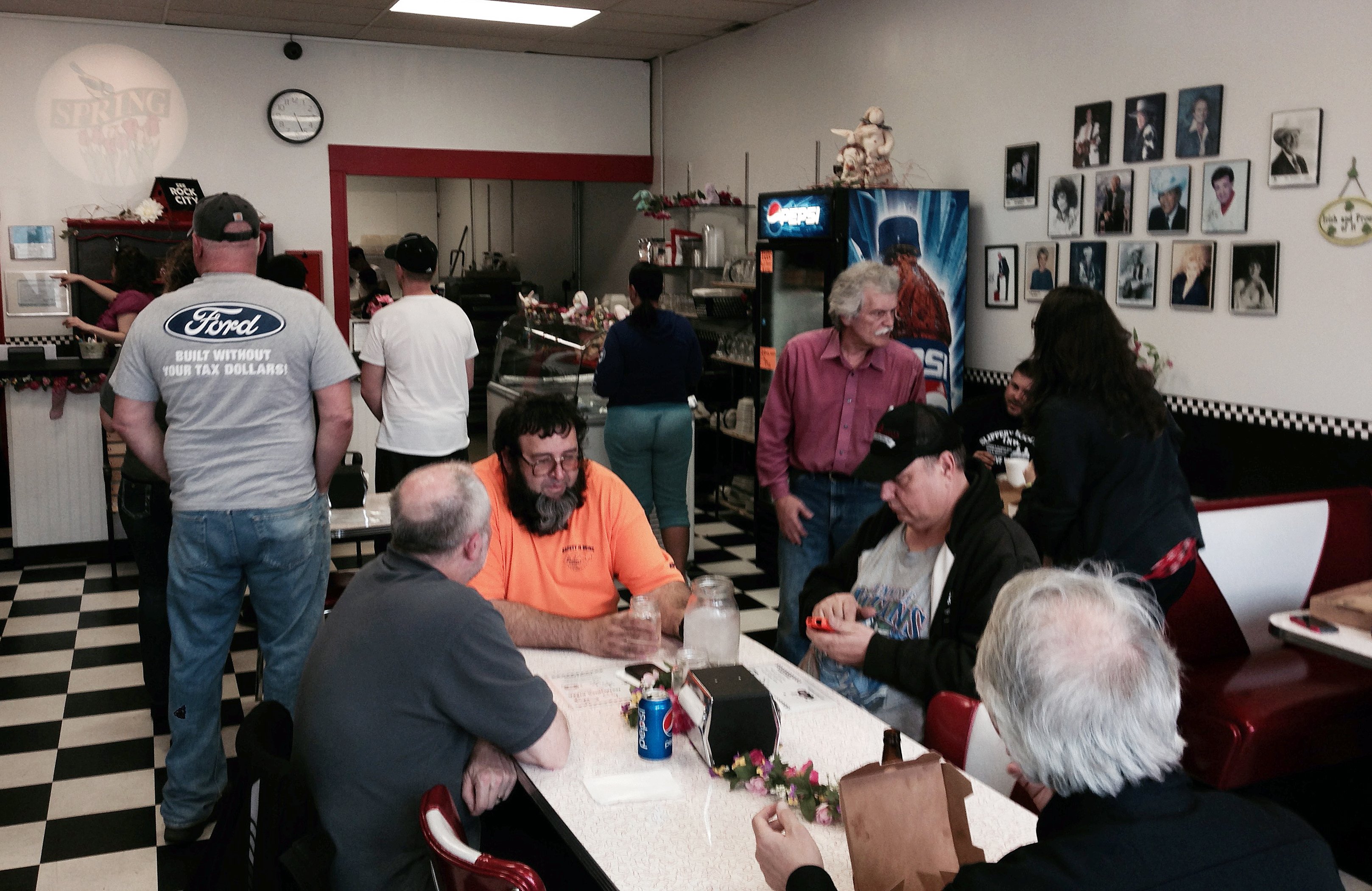 Many customers wait for service as Memories Pizza reopened for business ON April, 9, 2015, in Walkerton, Ind.