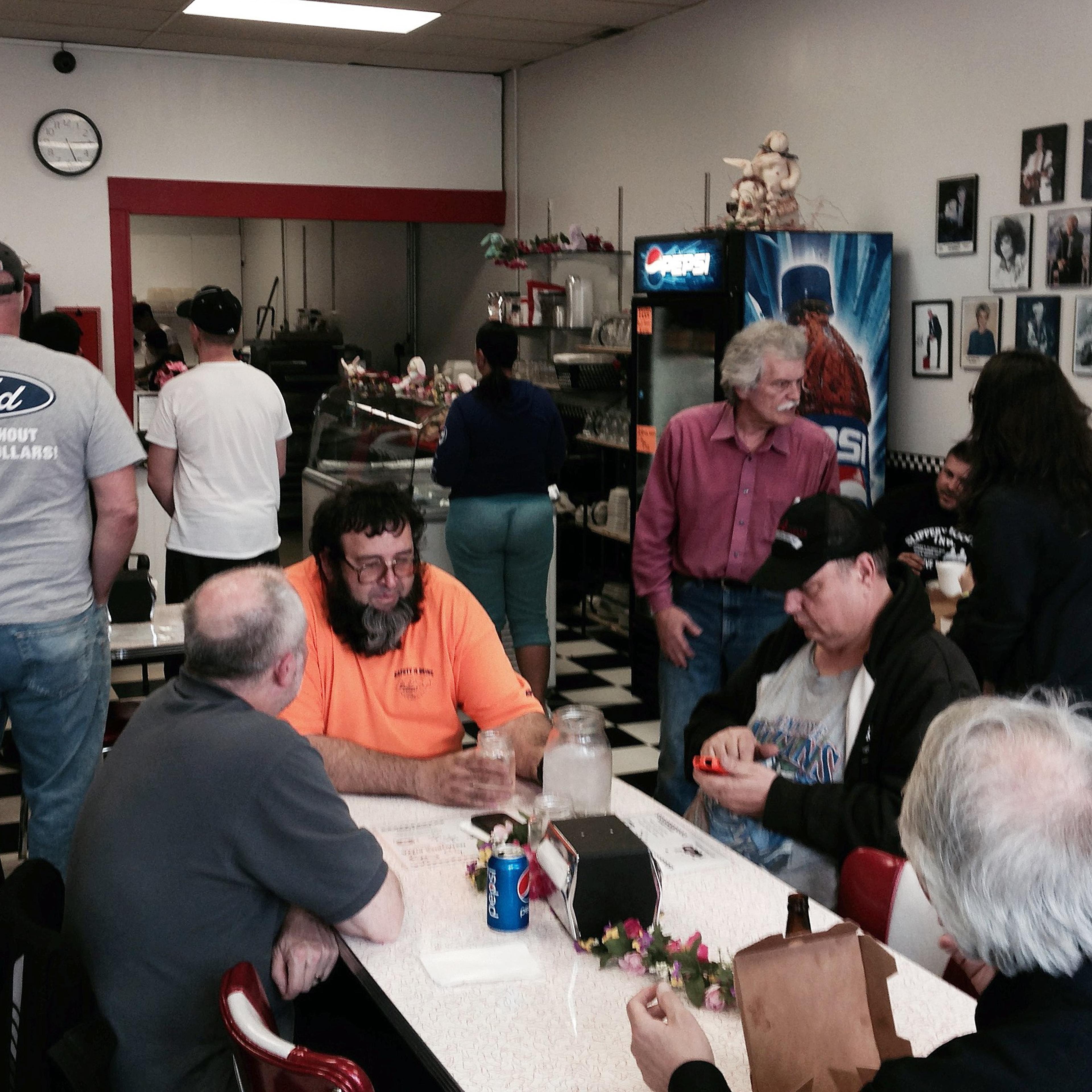 Many customers wait for service as Memories Pizza reopened for business ON April, 9, 2015, in Walkerton, Ind.