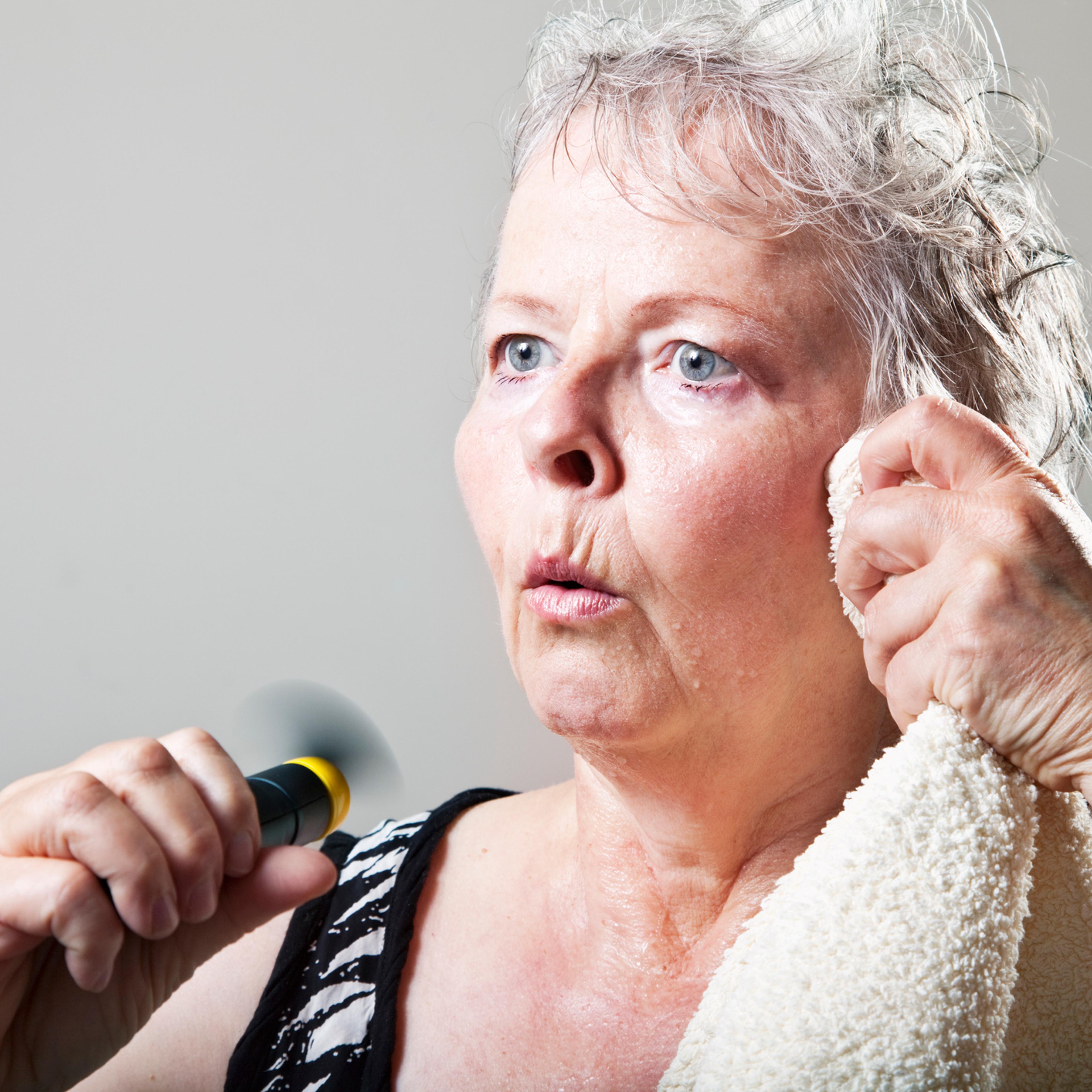 mature woman hot flash menopause portrait