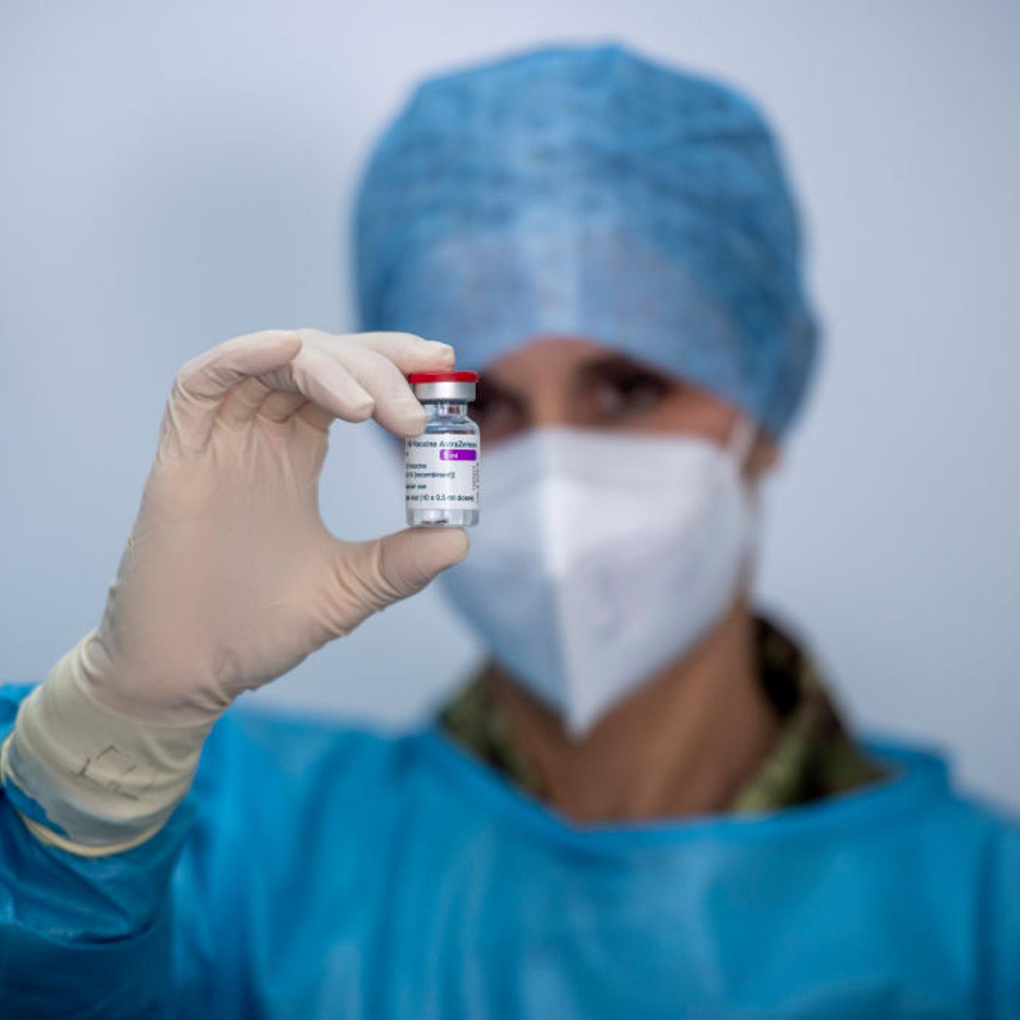 A healthcare worker of the Italian Army prepares doses of the AstraZeneca COVID-19 vaccine, as part of COVID-19 vaccinations plan for the military personnel, on February 23, 2021 in Rome, Italy.