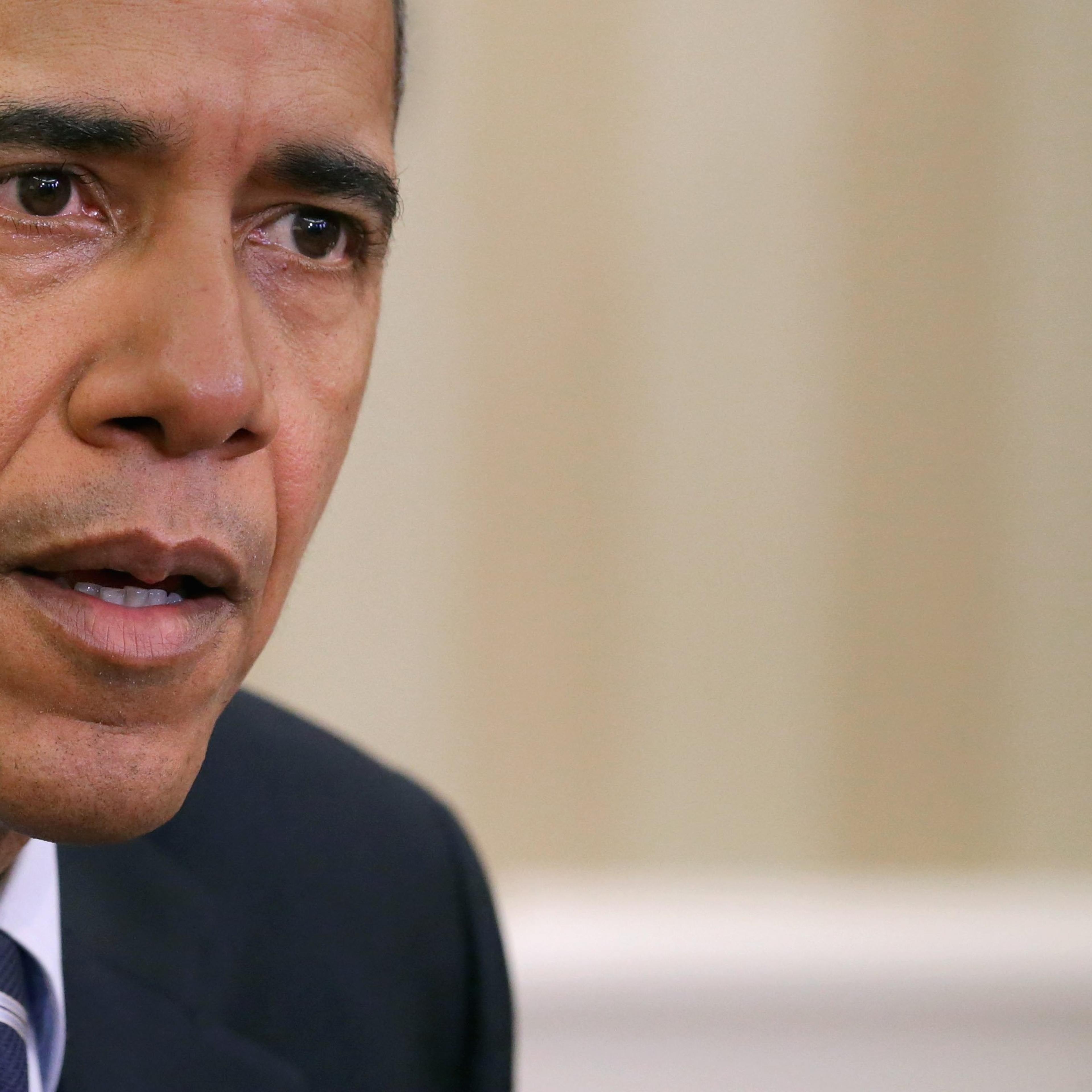 President Barack Obama delivers a statement to the news media after receiving a briefing from his national security team in the Oval Office at the White House in Washington, DC on Dec. 3, 2015.