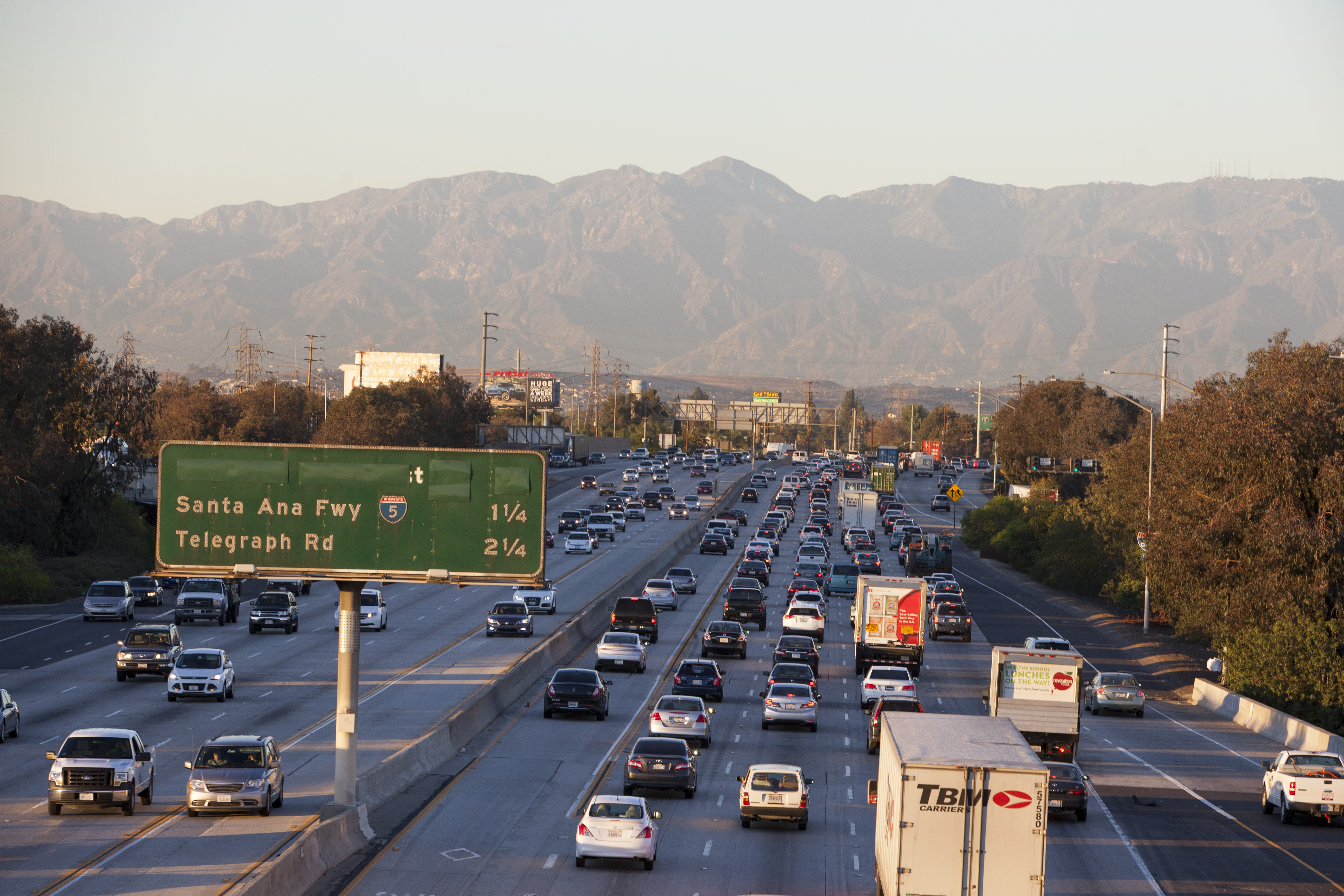 The 605 freeway is jammed with cars on a day when the mountains are visible in the distance, on November 5, 2014 in Los Angeles, California.