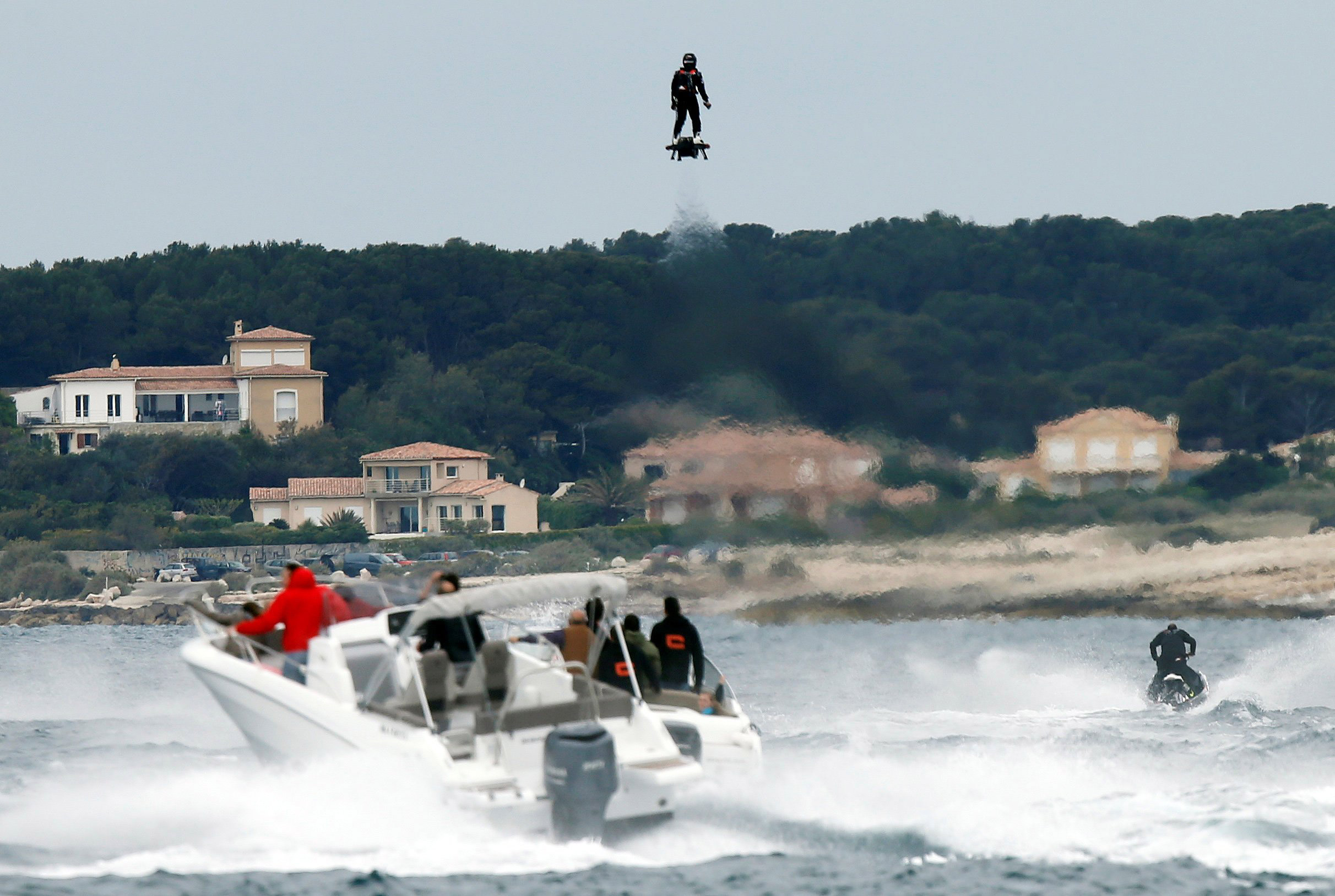Pilot and jet-ski champion Franky Zapata hovers in the air on an IPU Flyboard Air hoverboard as he breaks the Guiness World Records for furthest flight by hoverboard, after covering a distance of 2,252.4 meters (7,389.76 ft) with an average speed of 50-6
