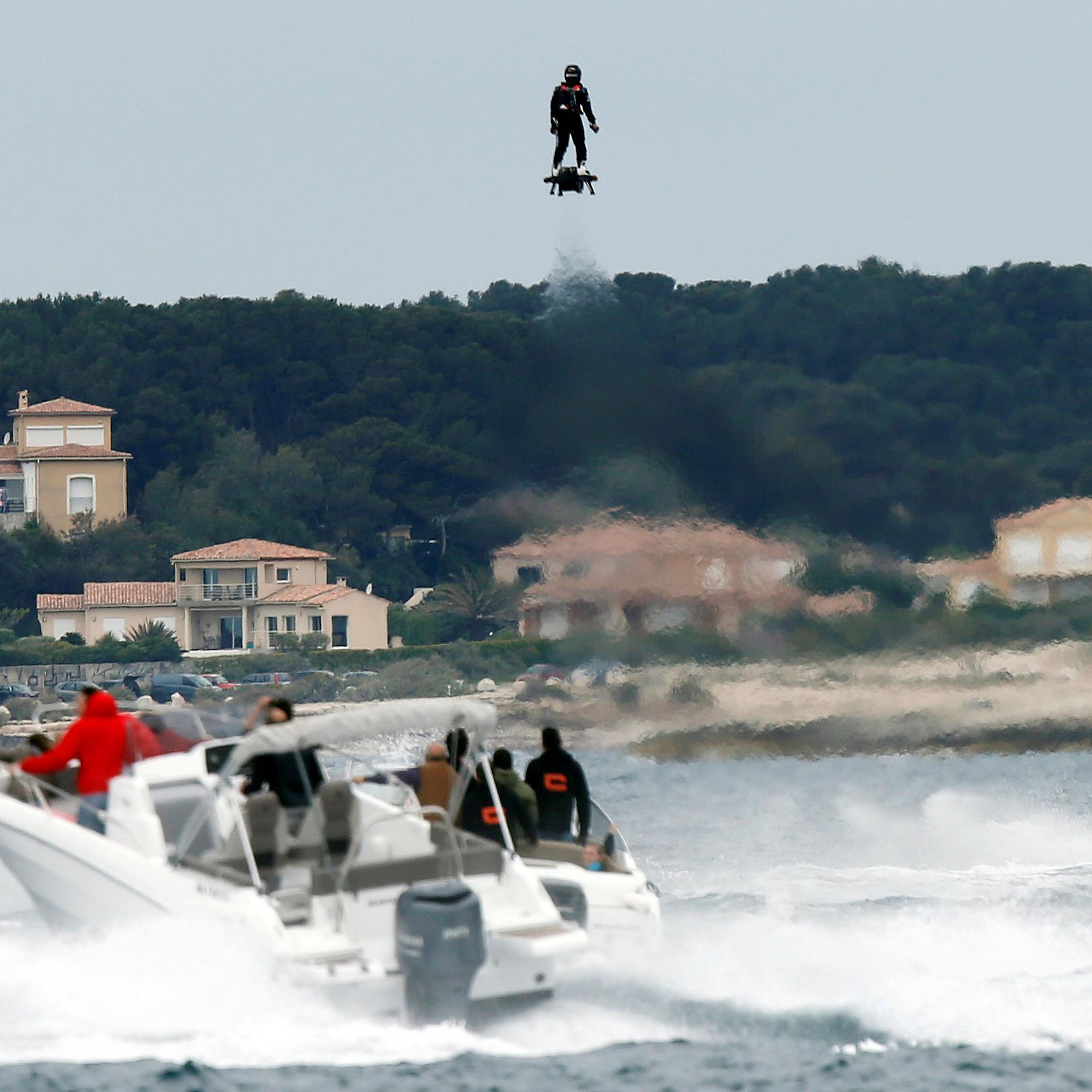 Pilot and jet-ski champion Franky Zapata hovers in the air on an IPU Flyboard Air hoverboard as he breaks the Guiness World Records for furthest flight by hoverboard, after covering a distance of 2,252.4 meters (7,389.76 ft) with an average speed of 50-6