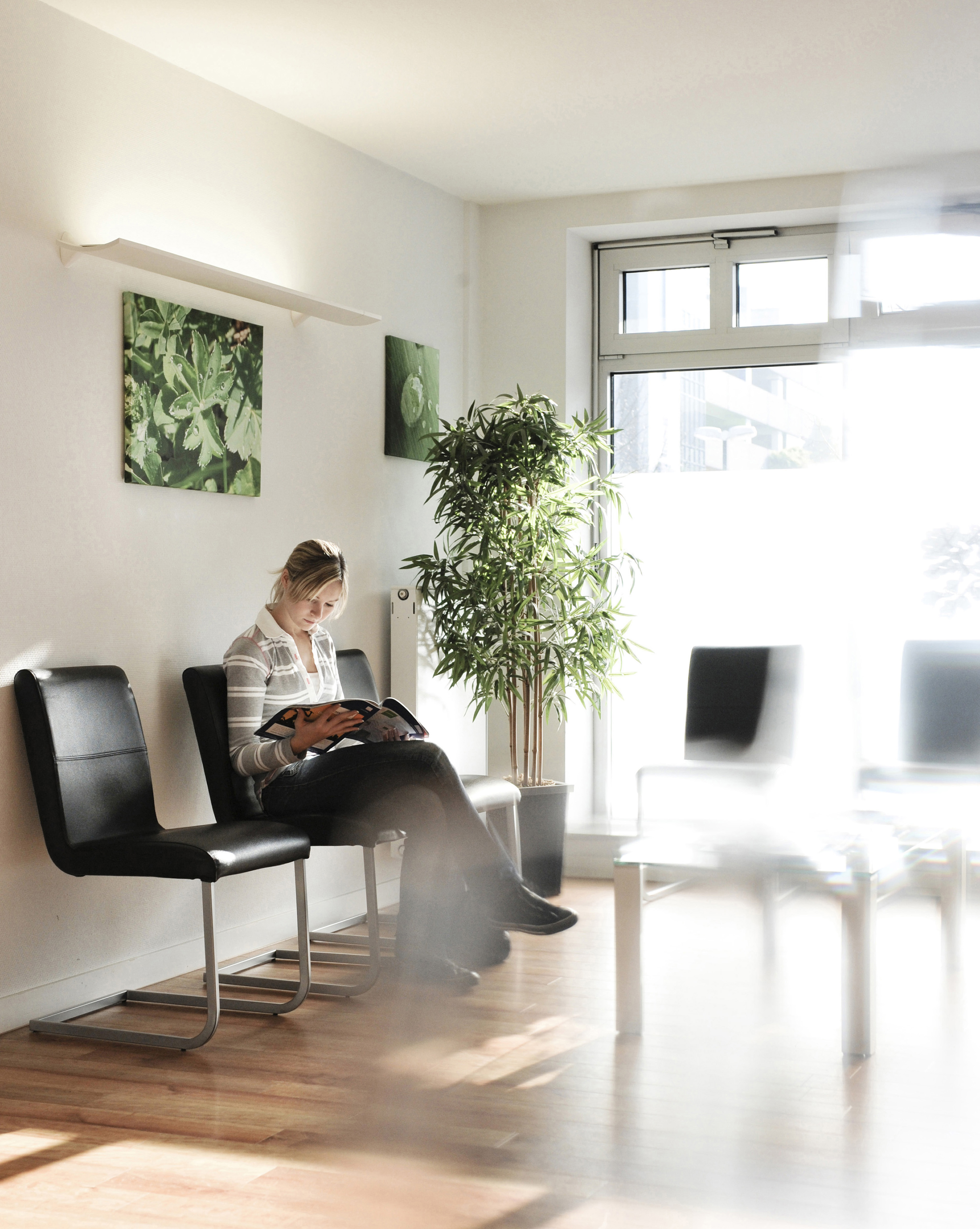 Woman in waiting room of a medical practice