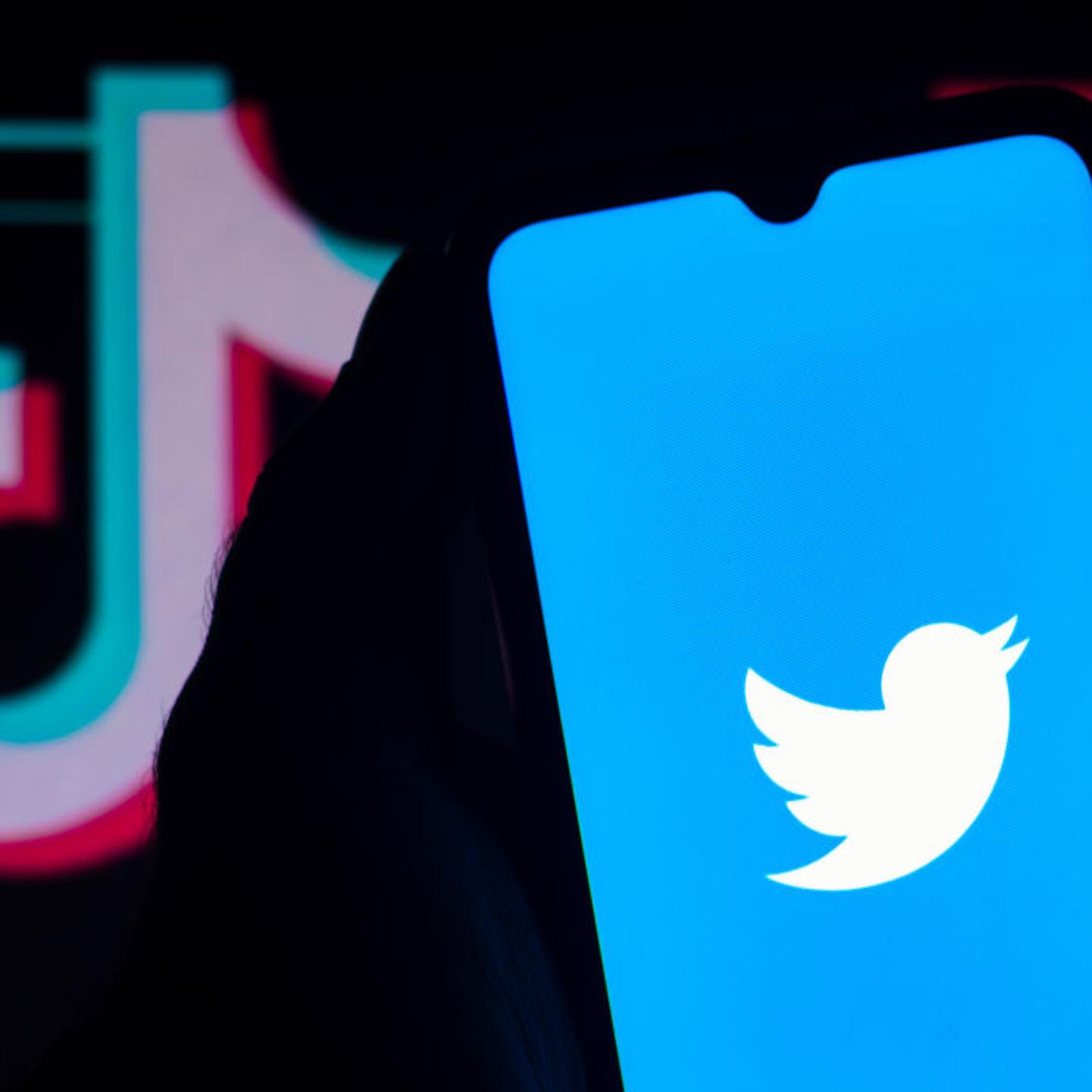 In this photo illustration the Twitter logo seen displayed