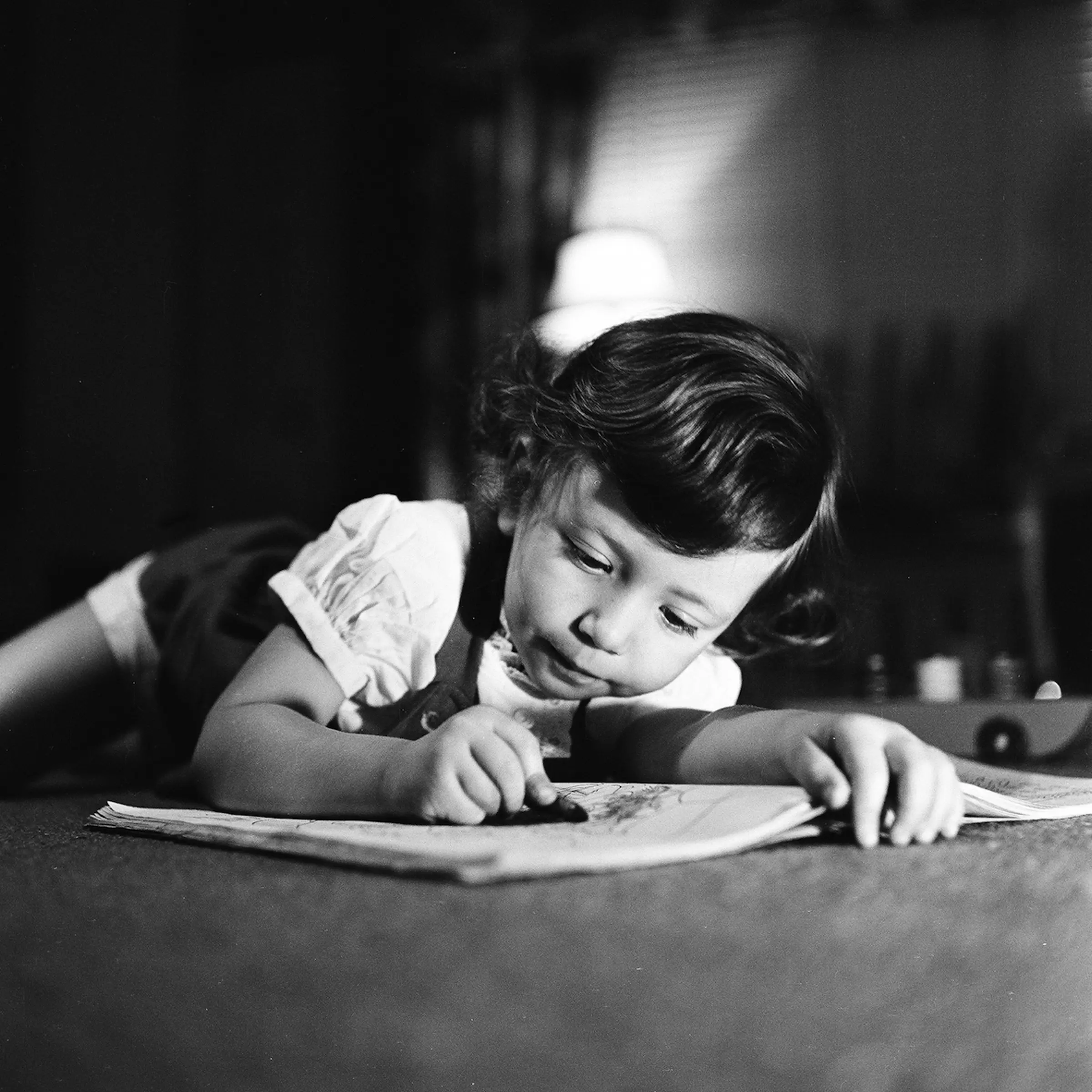 A Young Girl & Her Coloring Book