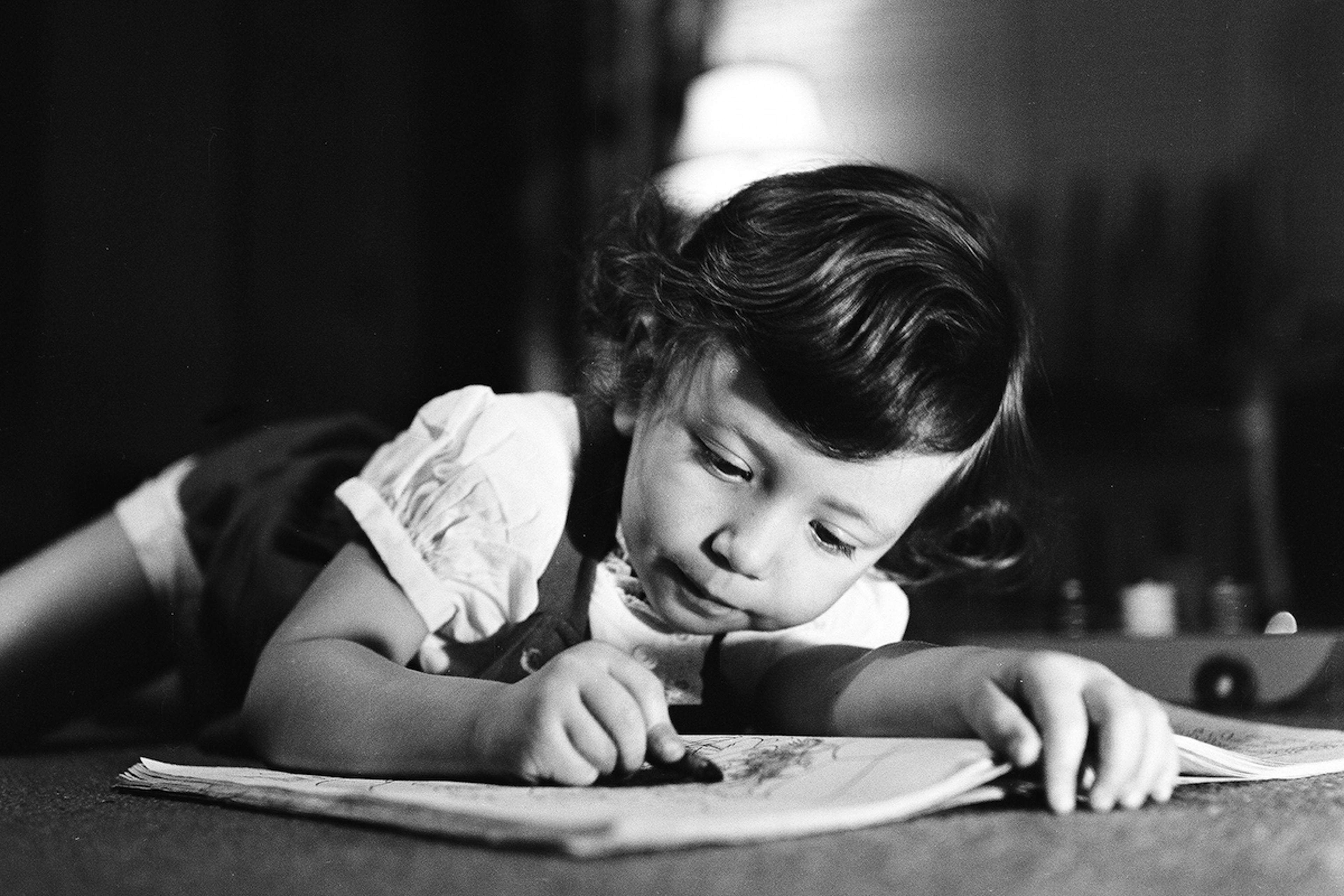 A Young Girl & Her Coloring Book