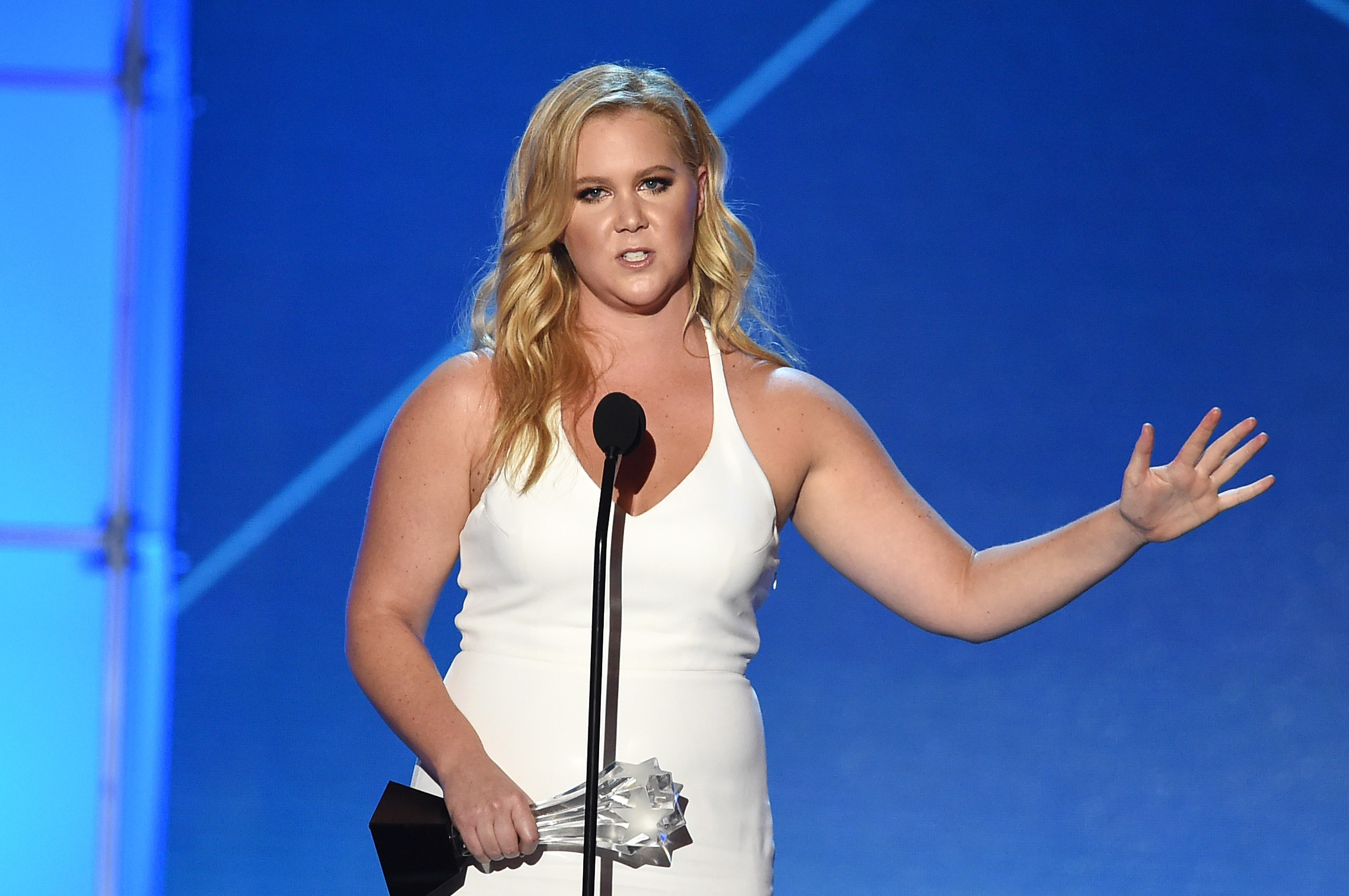 Actress-writer Amy Schumer accepts Critics' Choice MVP Award onstage during the 21st Annual Critics' Choice Awards at Barker Hangar on January 17, 2016 in Santa Monica, California.