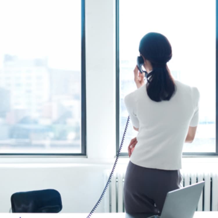 business-woman-phone-rear-view