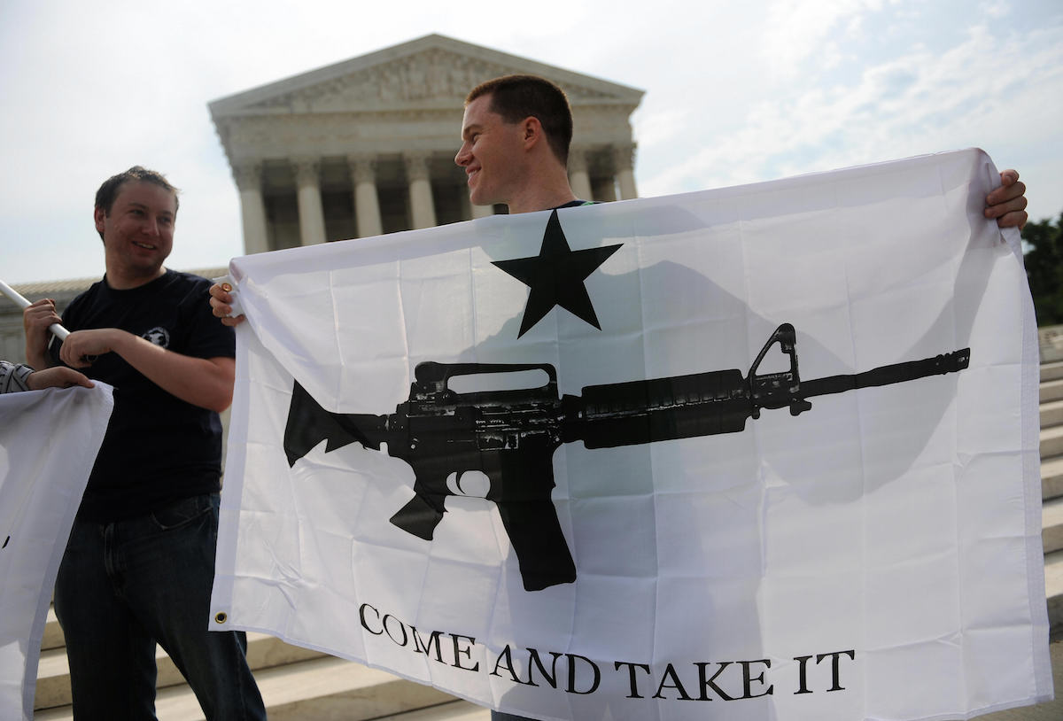 Gun rights activists celebrate the news