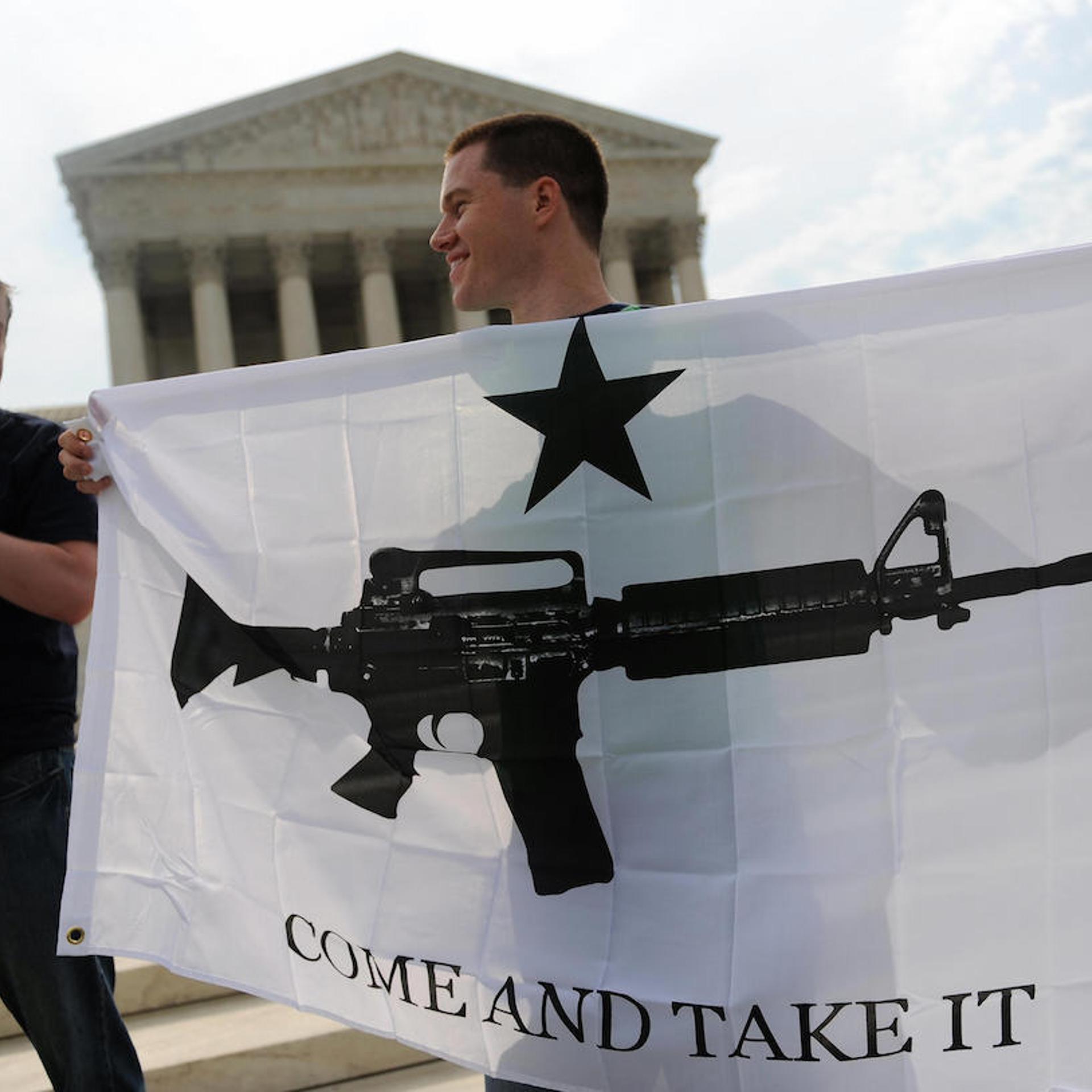 Gun rights activists celebrate the news