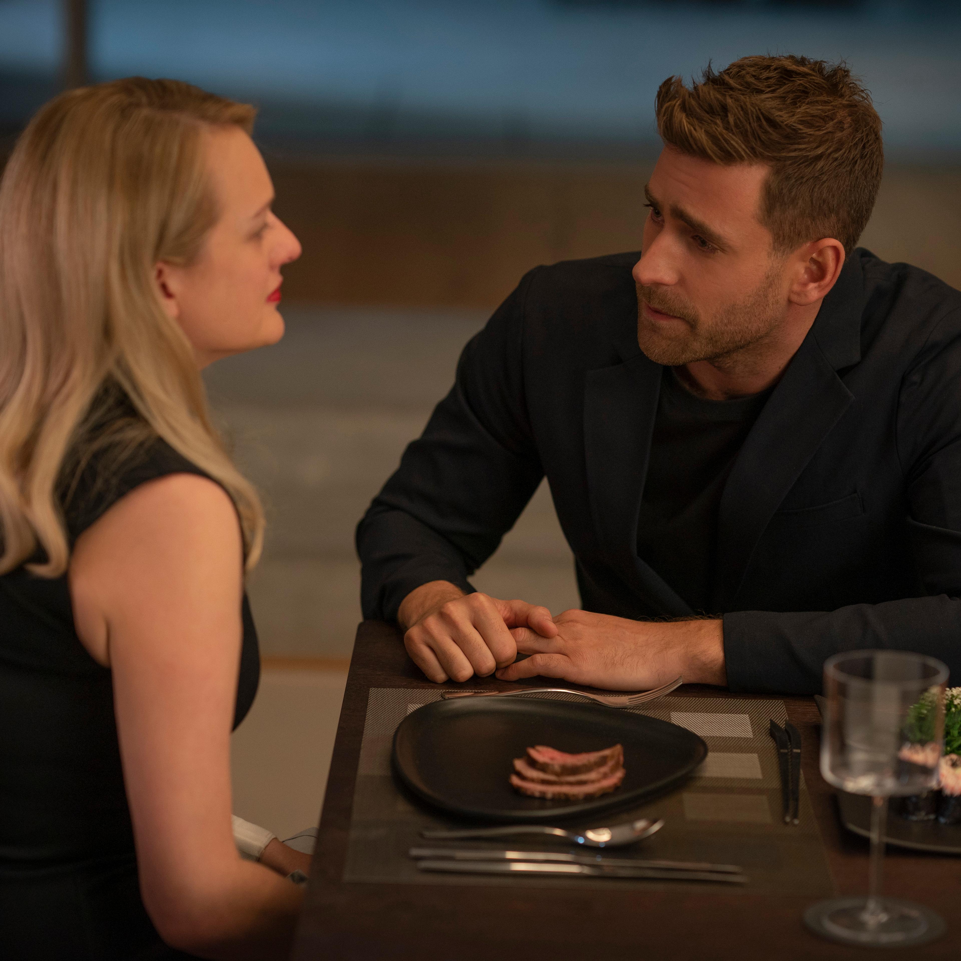 Cecilia Kass (Elisabeth Moss, back to camera) and Adrian Griffin (Oliver Jackson-Cohen) in "The Invisible Man," written and directed by Leigh Whannell.