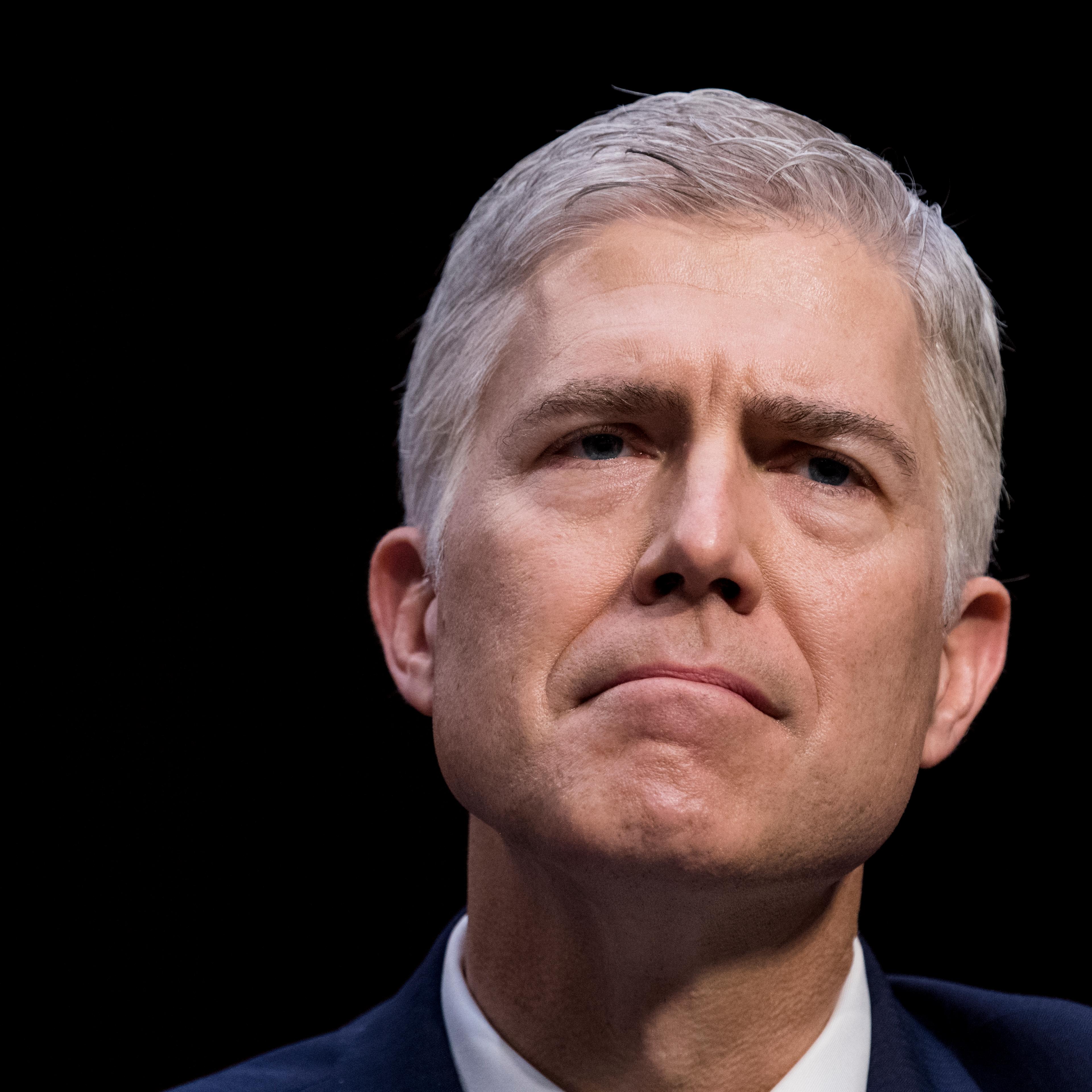 Neil Gorsuch, nominee to be Associate Justice of the U.S. Supreme Court, listens to Senators' opening statements during the first day of the Senate Judiciary Committee confirmation hearings on Monday, March 20, 2017.