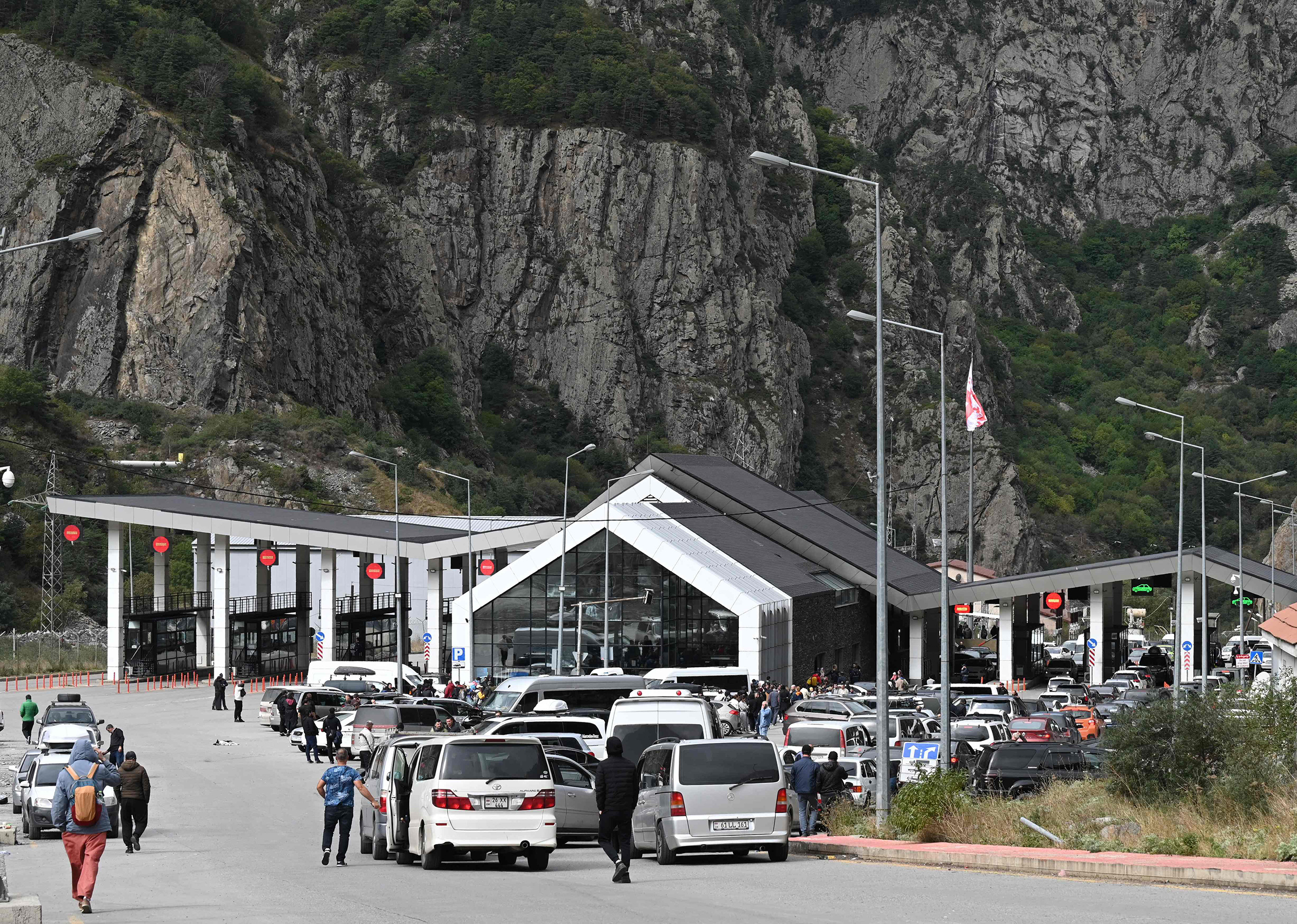 A general view of the Georgian side of the Verkhni Lars customs checkpoint between Georgia and Russia some 200km outside Tbilisi on Sept. 25. Russian authorities acknowledged a "significant" influx of cars trying to cross from Russia into Georgia on Sunday, days after Moscow announced a partial mobilization. 