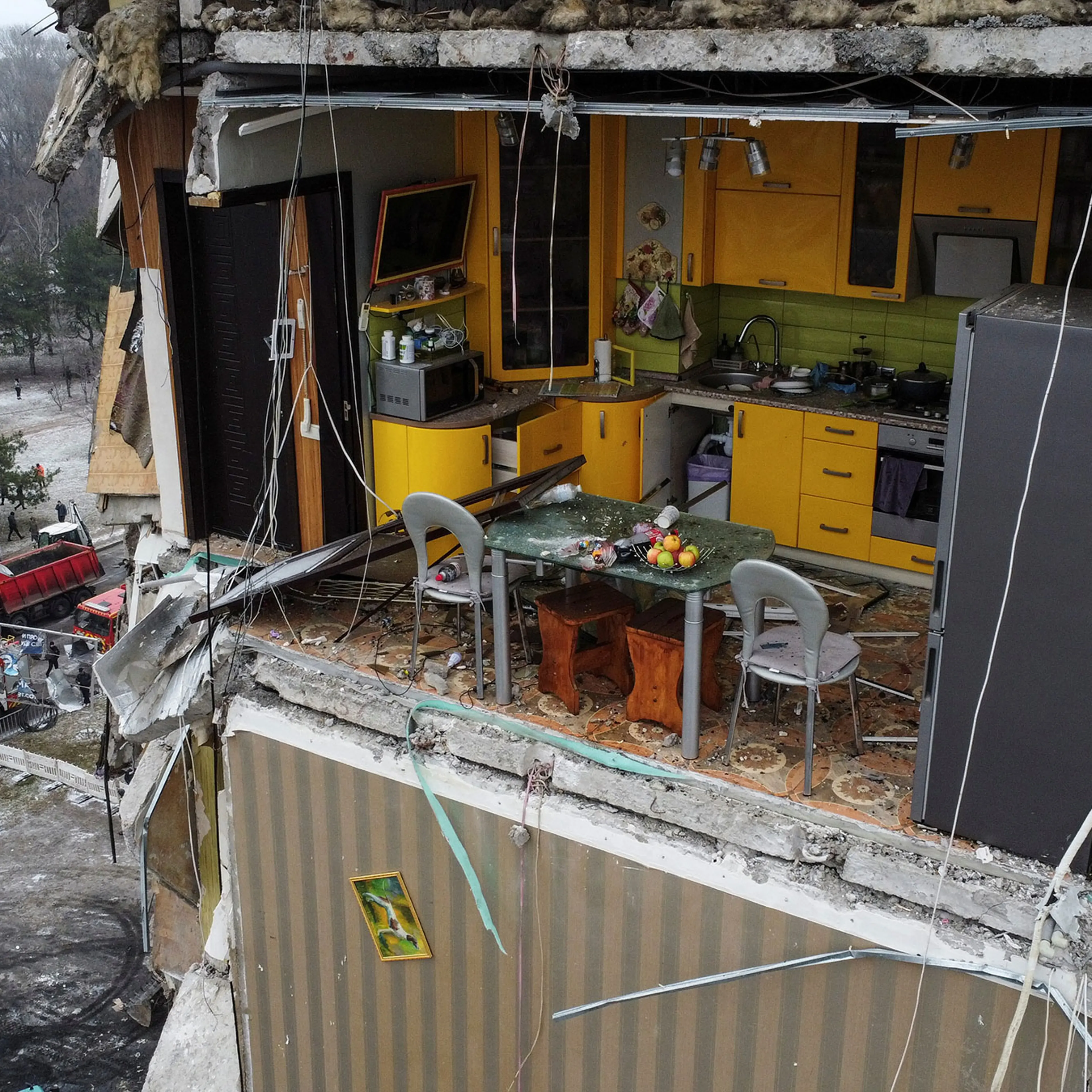 Aftermath of Dnipro apartment block destruction following missile strike