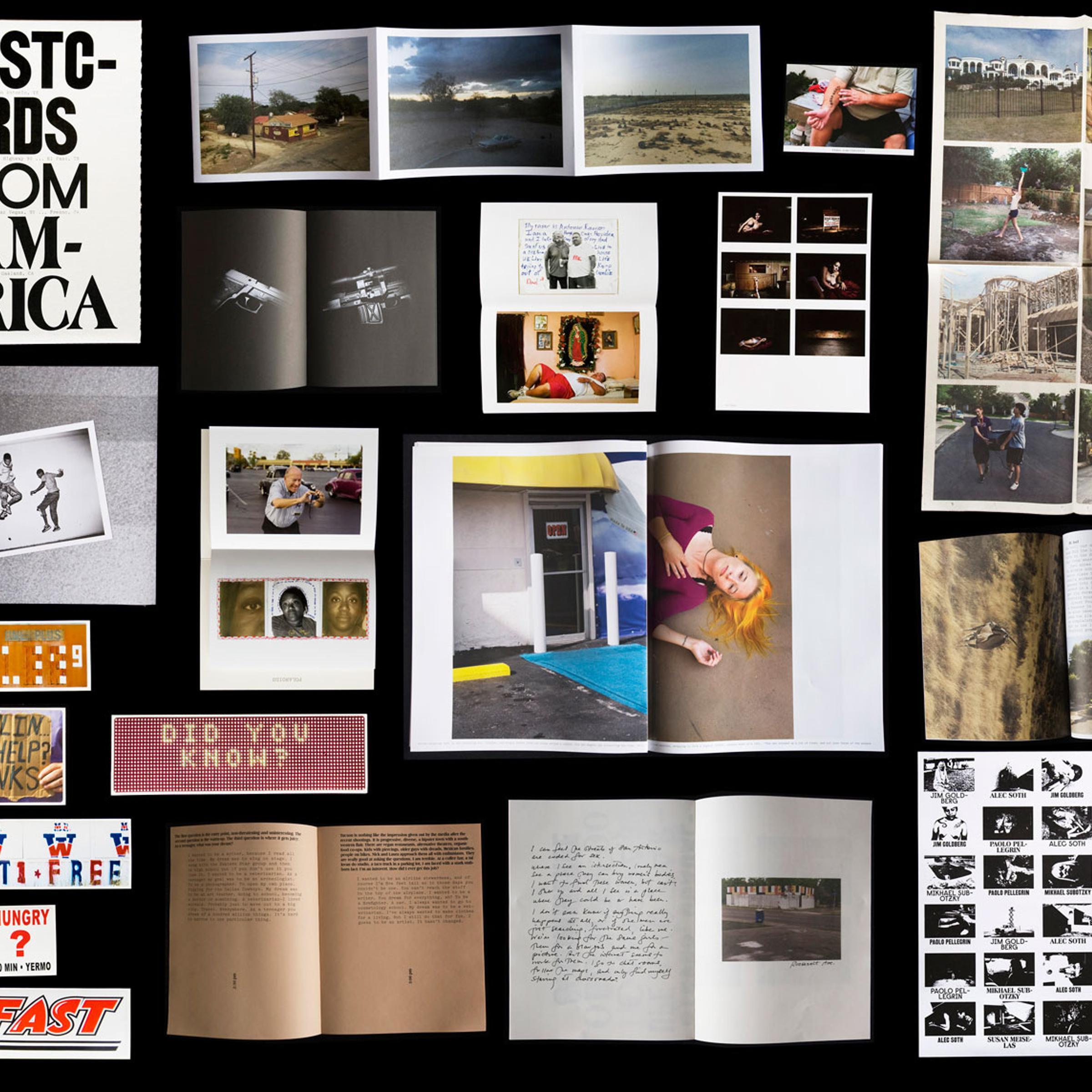 Postcards From America is a collection of objects: a book, five bumper stickers, a newspaper, two fold-outs, three cards, a poster and five zines.
