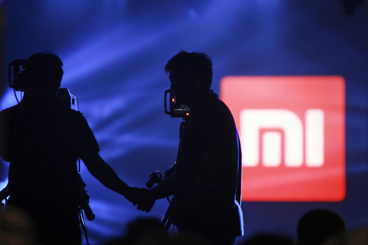 A logo of Xiaomi is seen at Xiaomi's tablet launch event in Beijing