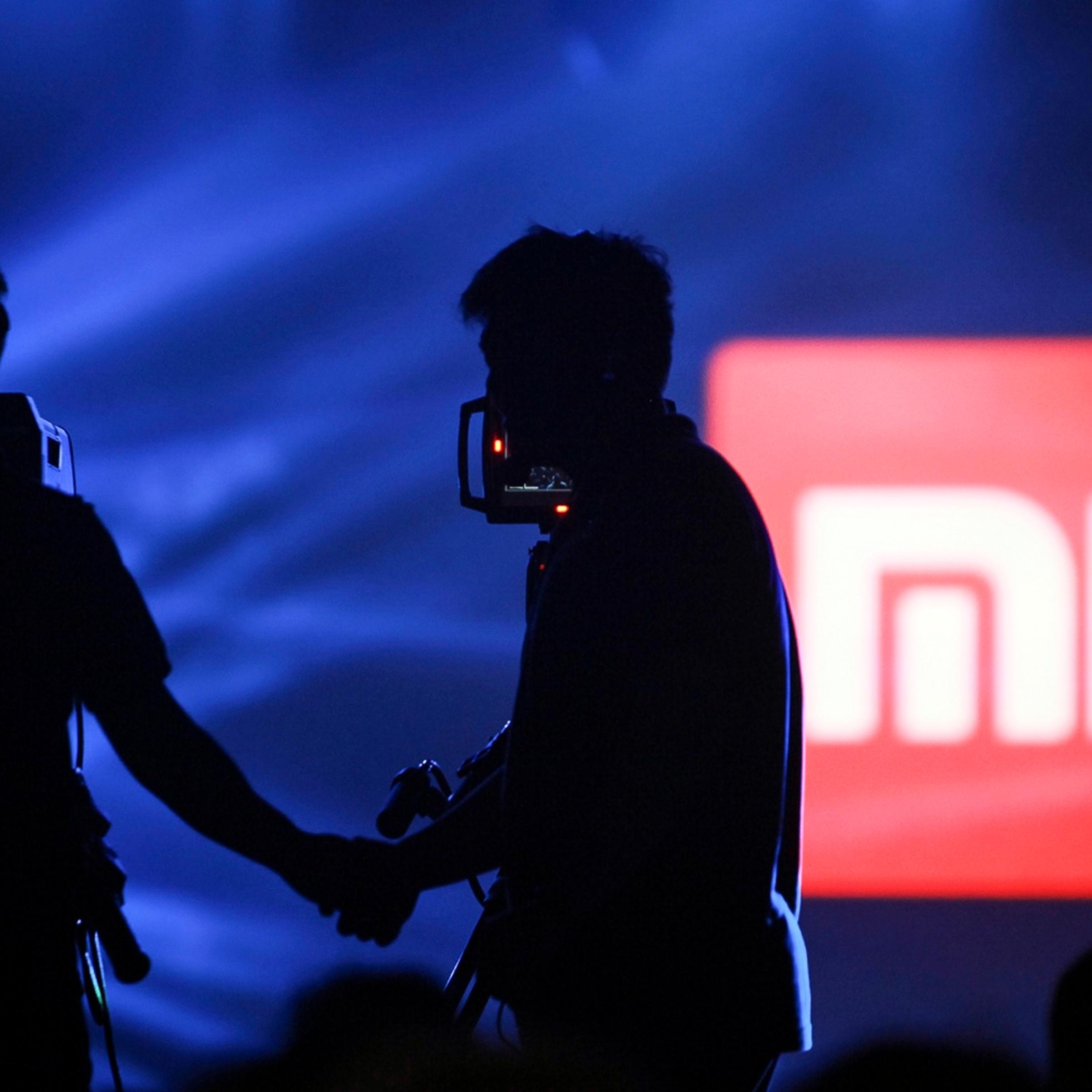 A logo of Xiaomi is seen at Xiaomi's tablet launch event in Beijing