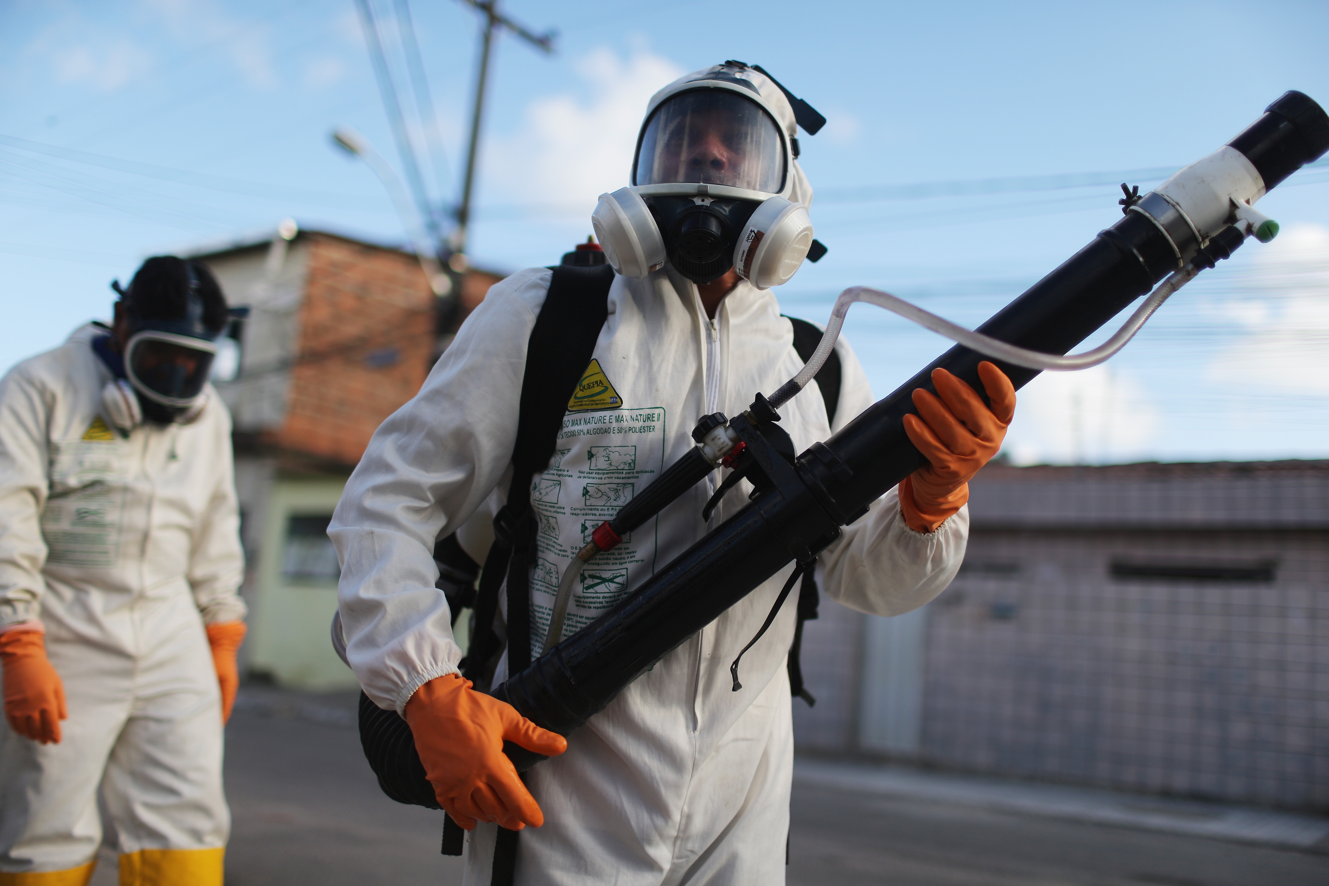 Health workers fumigate in an attempt to eradicate the mosquito which transmits the Zika virus on January 28, 2016 in Recife, Pernambuco state, Brazil.