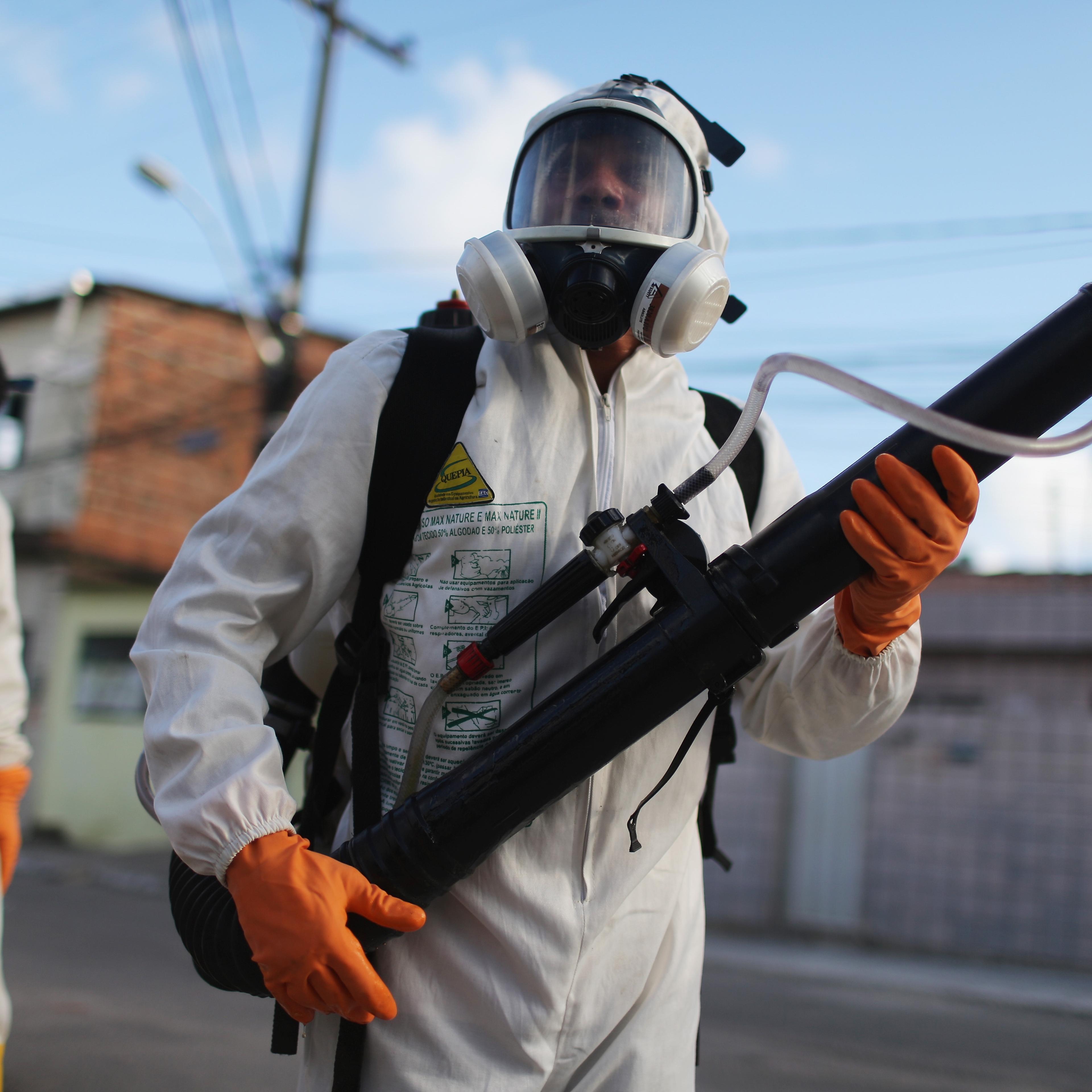 Health workers fumigate in an attempt to eradicate the mosquito which transmits the Zika virus on January 28, 2016 in Recife, Pernambuco state, Brazil.