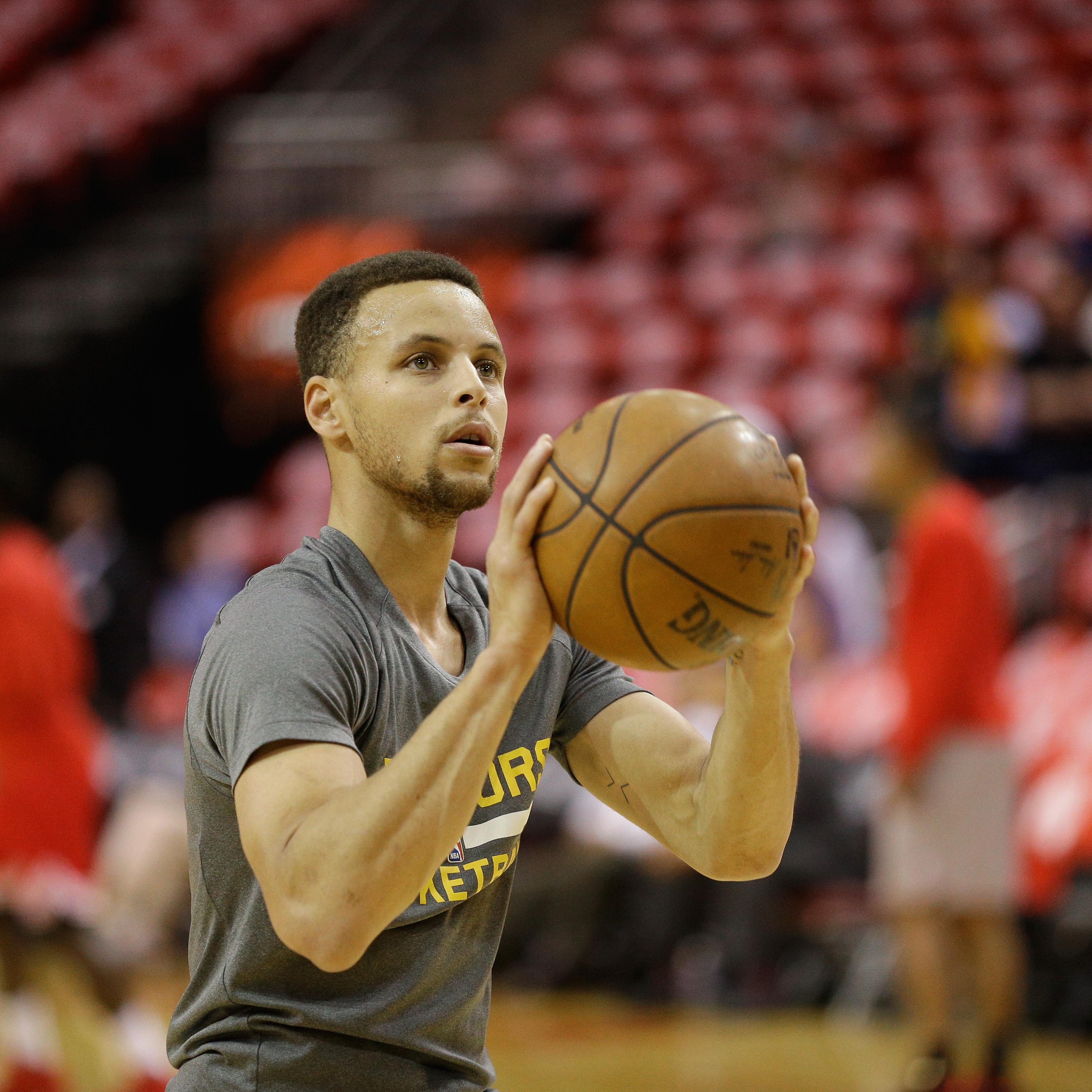 Stephen Curry #30 of the Golden State Warriors warms up before playing the Houston Rockets in game 4 of the first round of the Western Conference playoffs at Toyota Center on April 24, 2016 in Houston, Texas.