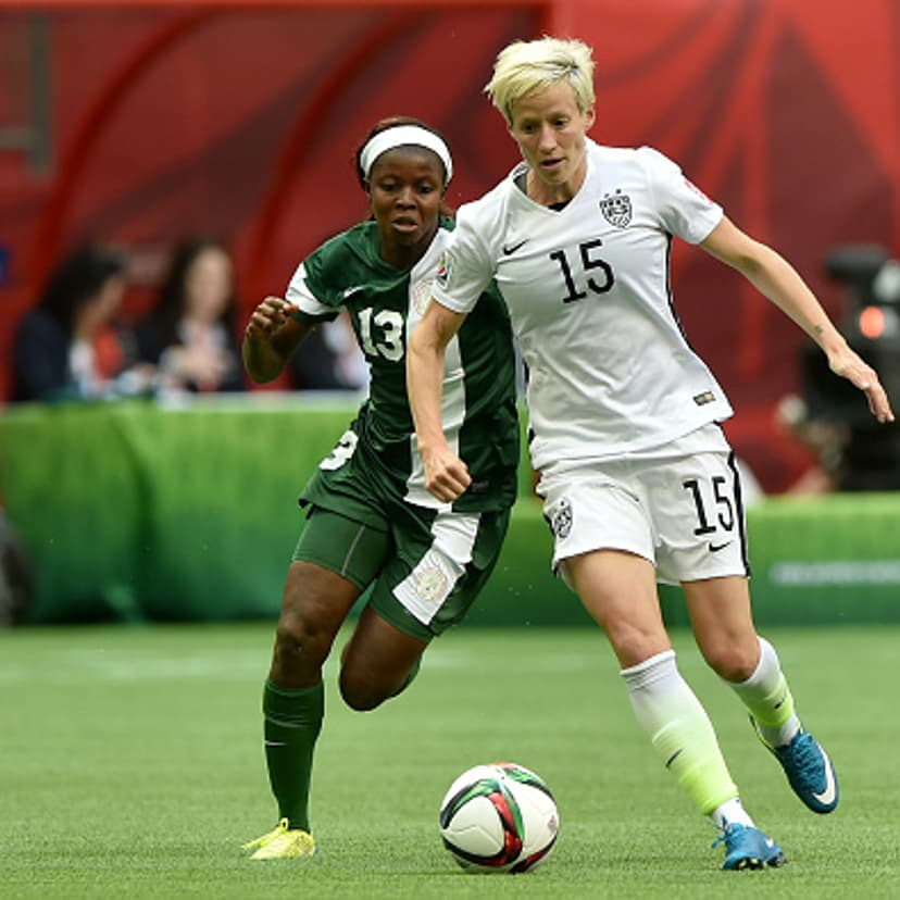Megan Rapinoe #15 of the United States and Ngozi Okobi #13 of Nigeria during the Group D match of the FIFA Women's World Cup Canada 2015 in Vancouver on June 16, 2015.